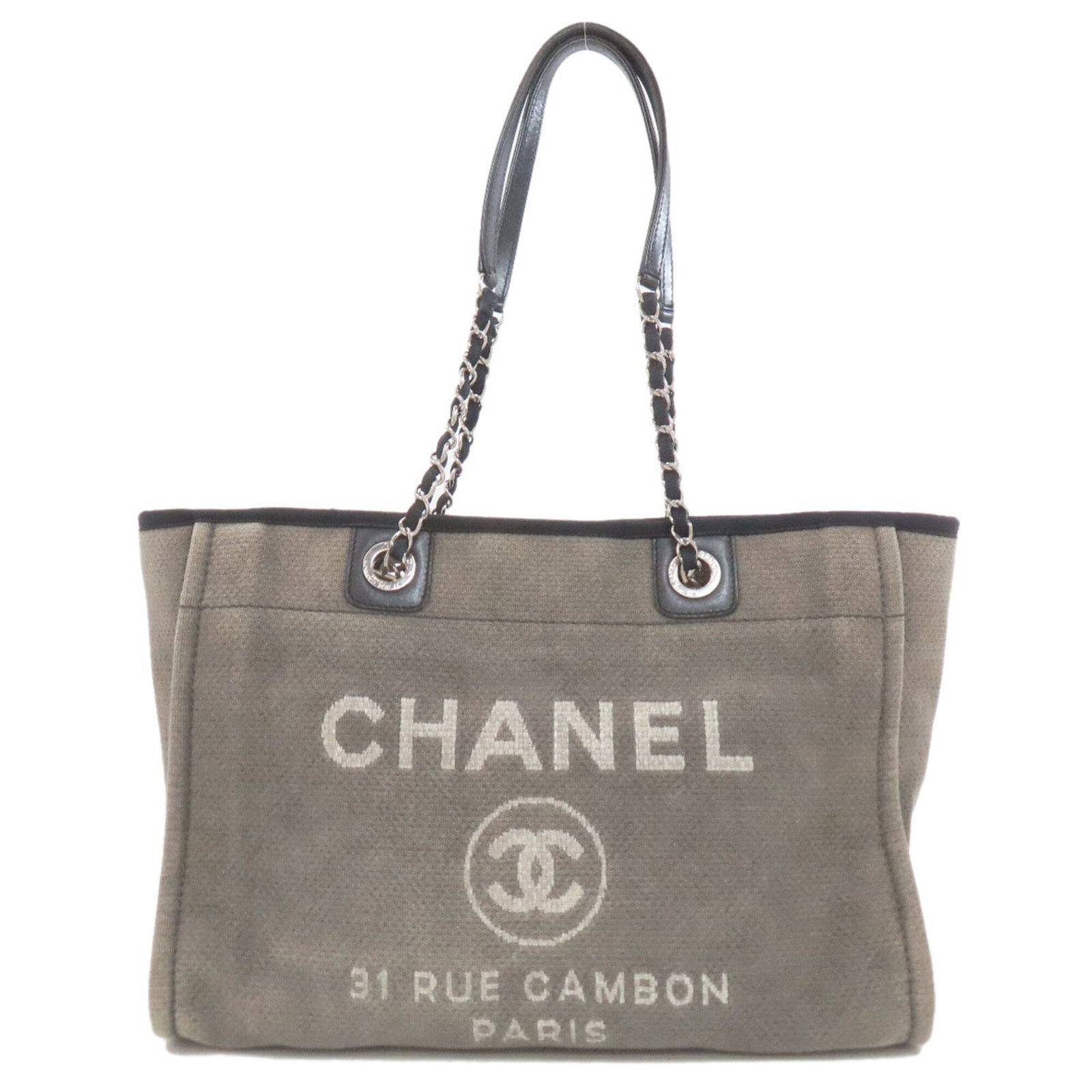 Leather Chanel Tote Bag: Leather Chanel Tote Bag Gray leather Chanel tote bag with a classic design, measuring 28cm x 42cm x 16cm. Made from high-quality leather, this bag features a timeless and sophisticated style. Its
