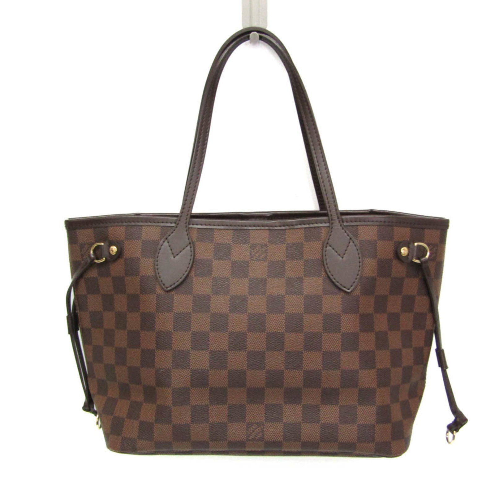 Damier Canvas Louis Vuitton Tote: Damier Canvas Louis Vuitton Tote Damier Canvas Louis Vuitton Tote, a timeless and stylish accessory, boasts a classic design with a Damier canvas exterior and a sleek Ebene color. This Neverfull PM to