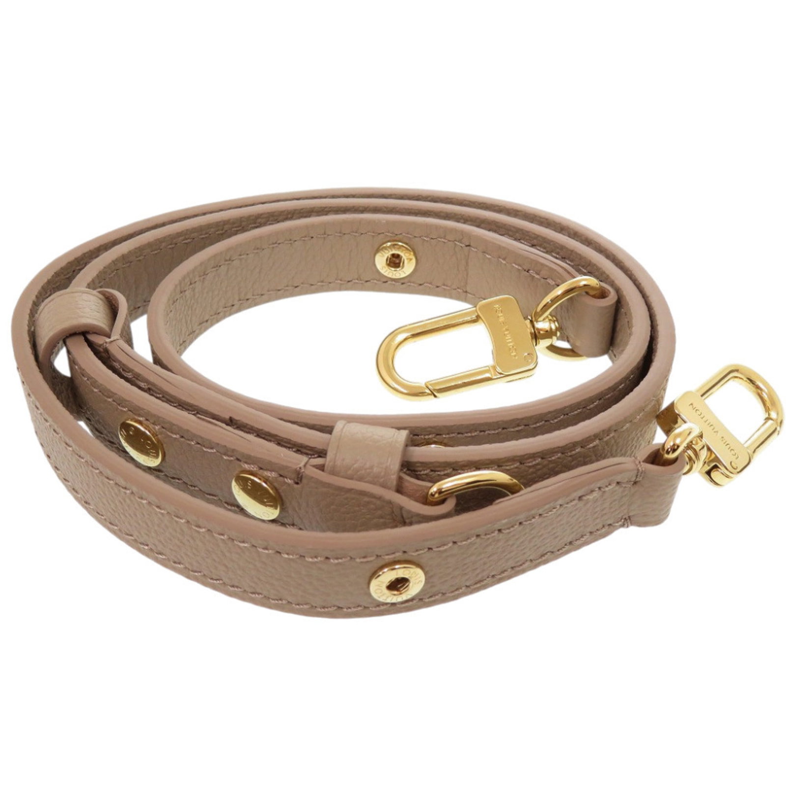 Leather Strap Louis Vuitton: Leather Strap Louis Vuitton Beige and gold leather strap from Louis Vuitton, measuring 98cm x 2cm. This strap features a classic design with a subtle gold accent. Made from high-quality leather, it