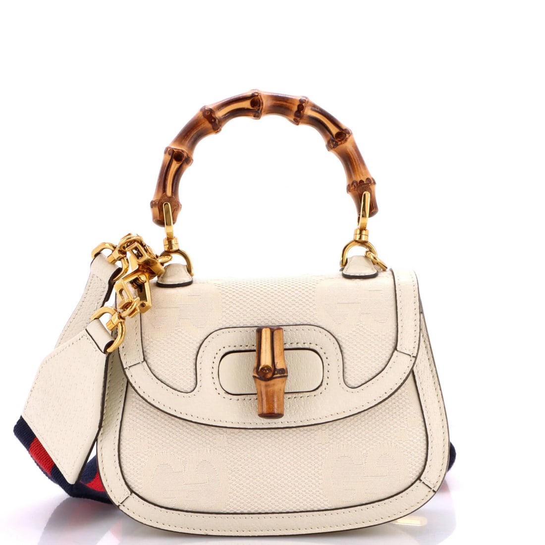 Gucci Bamboo GG Canvas 1947 Mini Jumbo Top Handle Bag: Gucci Bamboo GG Canvas 1947 Mini Jumbo Top Handle Bag Gucci Bamboo GG Canvas 1947 Mini Jumbo Top Handle Bag is a stylish and compact cross-body bag featuring a neutral exterior and interior, with a