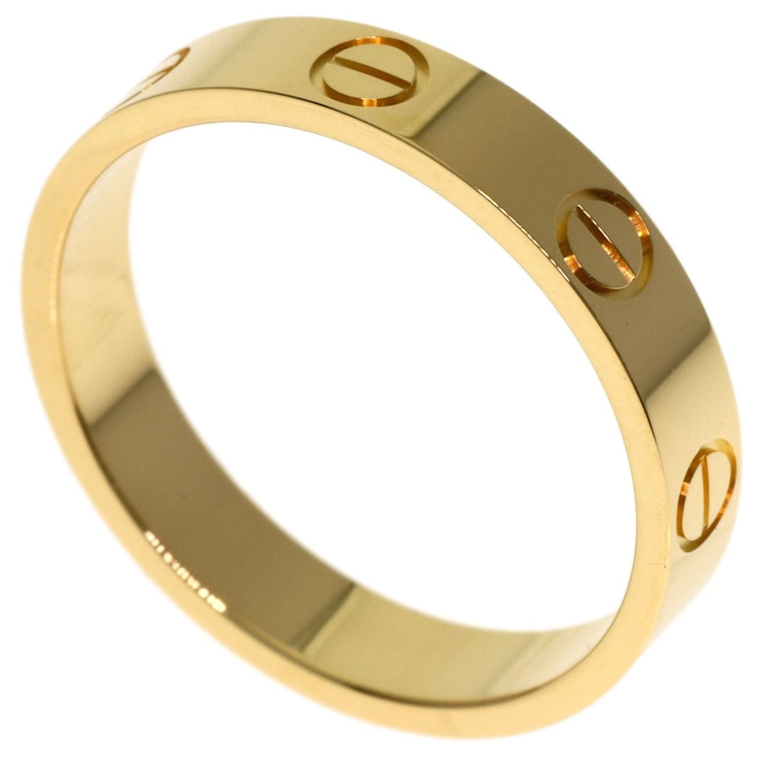 Cartier Mini Love Ring # 52 Ring K18 Yellow Gold: Cartier Mini Love Ring # 52 Ring K18 Yellow Gold Cartier's Mini Love Ring #52 is a delicate, 18k yellow gold ring featuring a signature that bears the Cartier mark. This K18 yellow gold ring is a clas