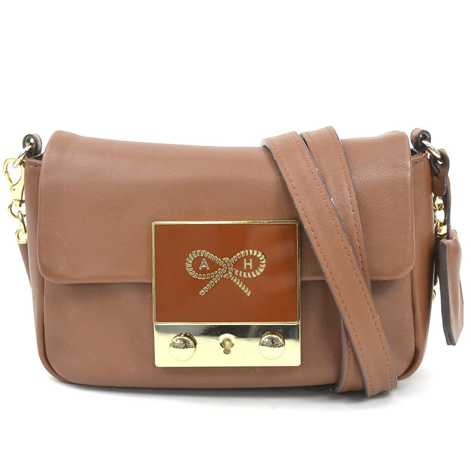 Hindmarch Leather Shoulder Bag: Hindmarch Leather Shoulder Bag The Hindmarch Leather Shoulder Bag is a stylish and compact accessory, measuring 12cm x 18cm x 5cm. Made from high-quality leather, this shoulder bag features a classic