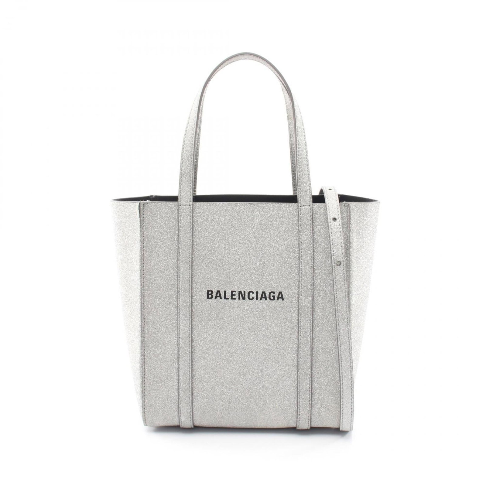 Balenciaga Handbag Tote Bag Leather: Balenciaga Handbag Tote Bag Leather Balenciaga's sleek Silver Leather Tote Bag is a stylish everyday accessory. Measuring 22cm x 19cm x 9cm, this tote bag is a compact and practical choice. Its