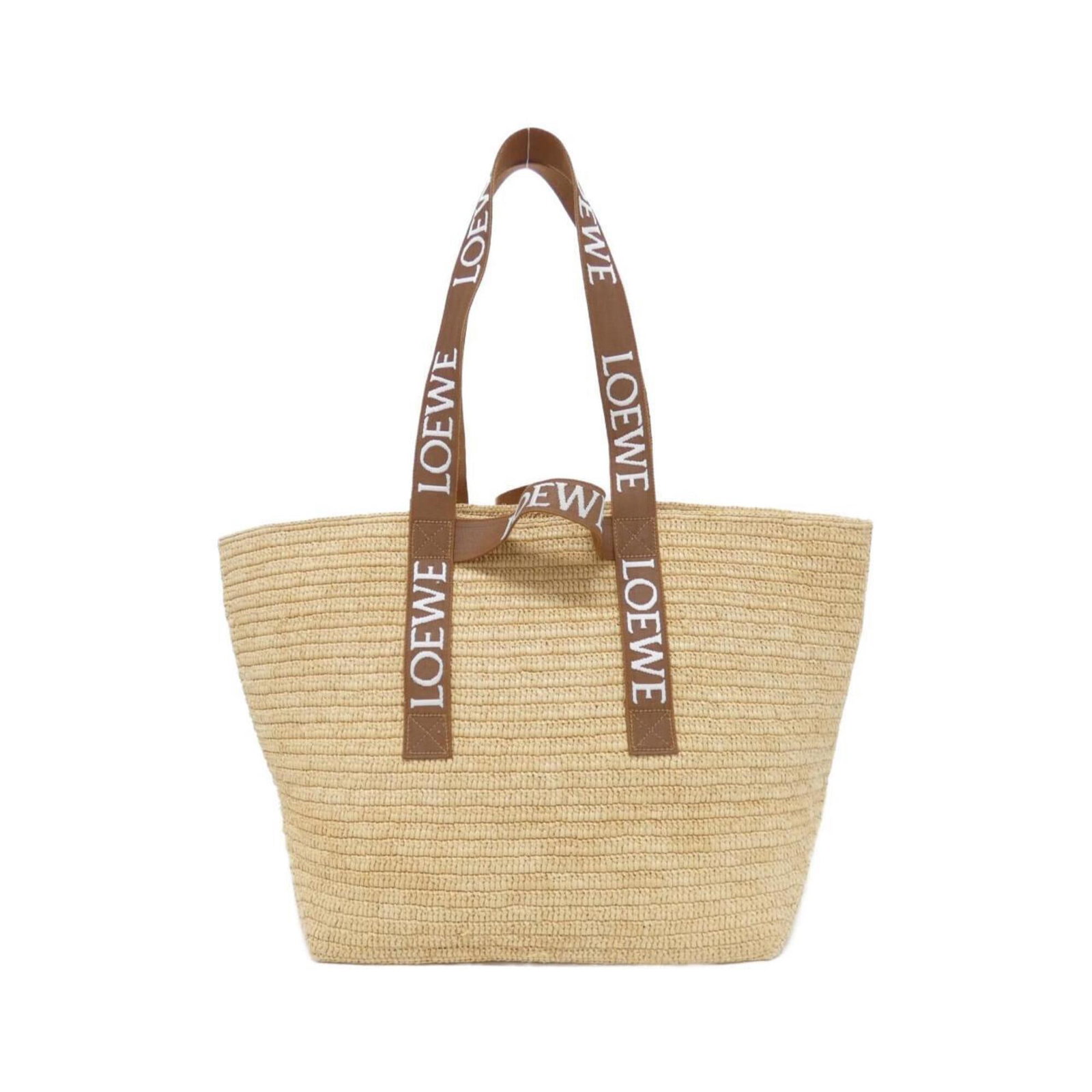 Handbag Loewe Raffia: Handbag Loewe Raffia Raffia material adds a unique texture to this Beige Loewe handbag, measuring 33cm x 55cm x 21cm. The bag's size and shape are typical of Loewe's designs, featuring a classic