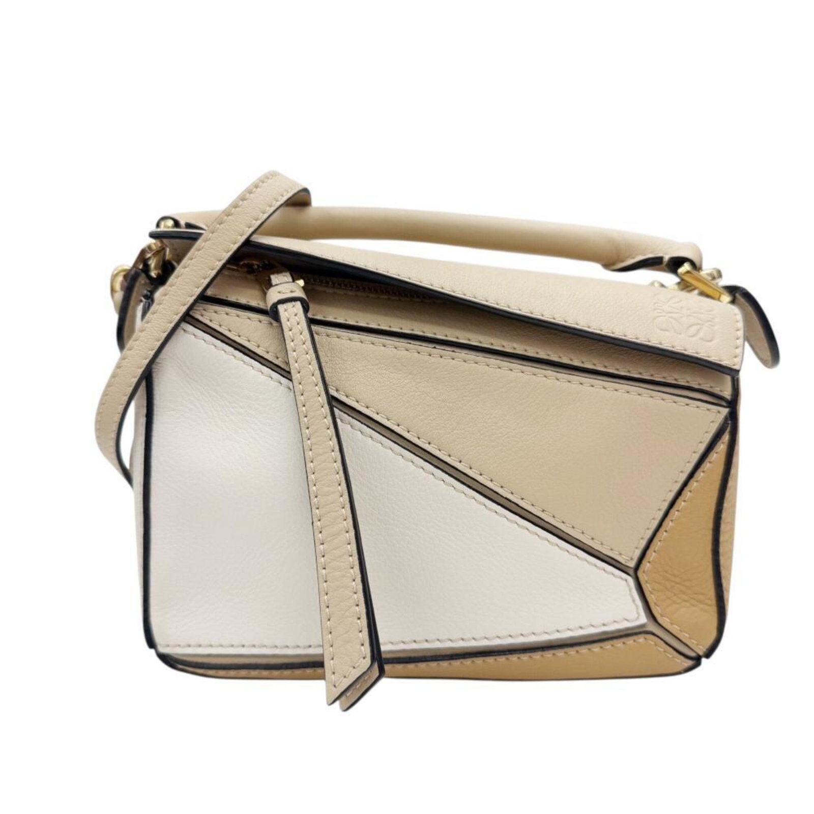 Shoulder Bag Leather Loewe Handbag: Shoulder Bag Leather Loewe Handbag The Loewe Shoulder Bag is a beautifully crafted leather handbag, made from high-quality Calfskin leather in a classic beige color. Measuring 11cm x 17cm x 8cm, this
