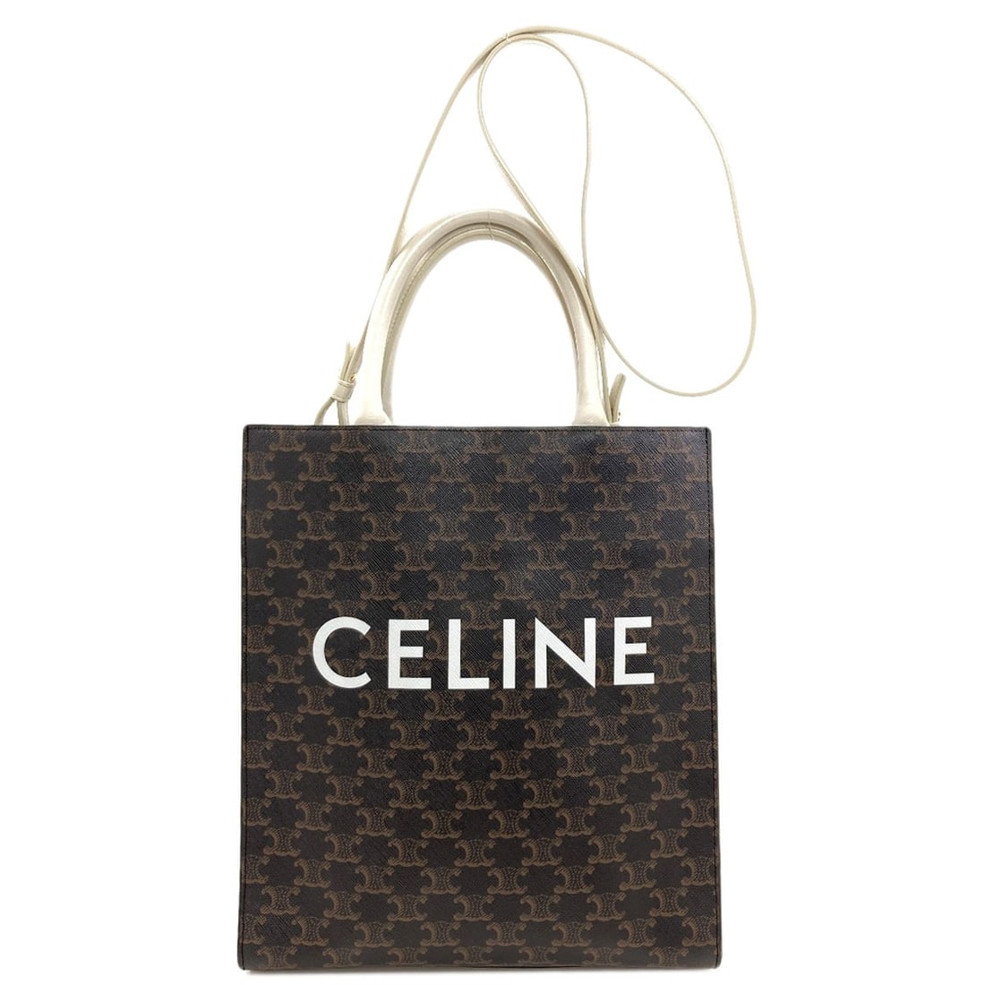 Cabas Pvc Handbag 2Way Triomphe Vertical Celine: Cabas Pvc Handbag 2Way Triomphe Vertical Celine Cabas Pvc Handbag 2Way Triomphe Vertical Celine features a striking brown exterior made from PVC, a unique and eye-catching material choice. The handbag