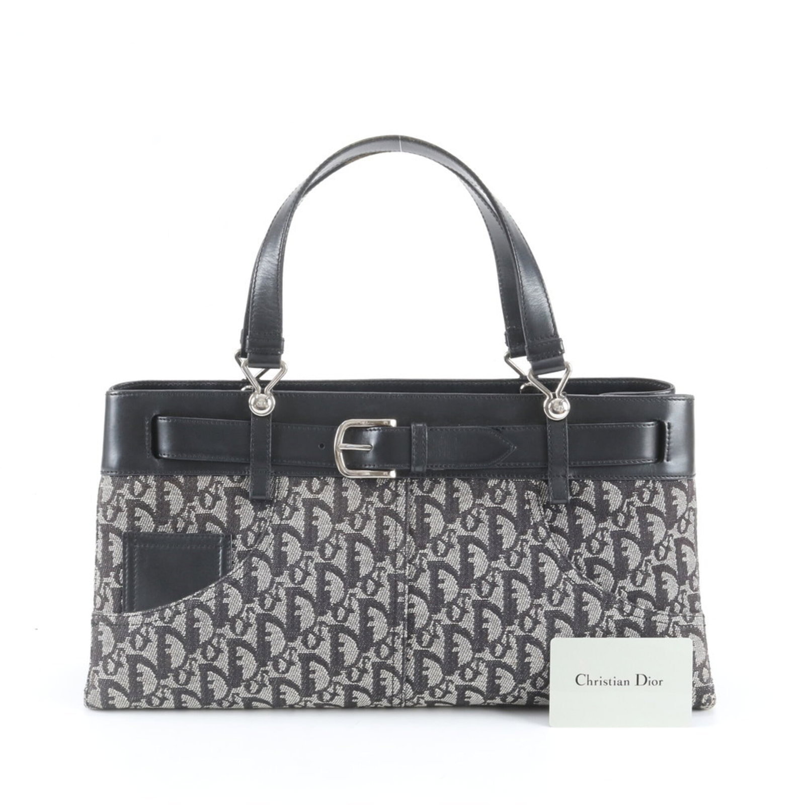 Handbag Dior Tote Leather Bag Canvas: Handbag Dior Tote Leather Bag Canvas The Christian Dior Tote Leather Bag Canvas is a sleek and sophisticated handbag, crafted from high-quality leather and canvas. Measuring 20cm x 39cm x 11cm, it