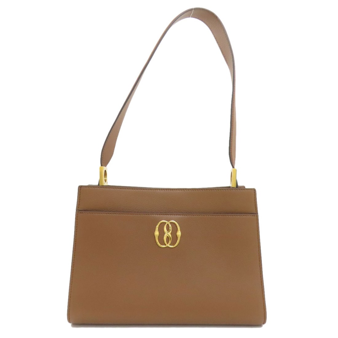 Trapeze Shoulder Leather Bag: Trapeze Shoulder Leather Bag Trapeze Shoulder Leather Bag in Brown features a rich, brown leather exterior, showcasing a classic shoulder bag style. The bag's design is complemented by its brown