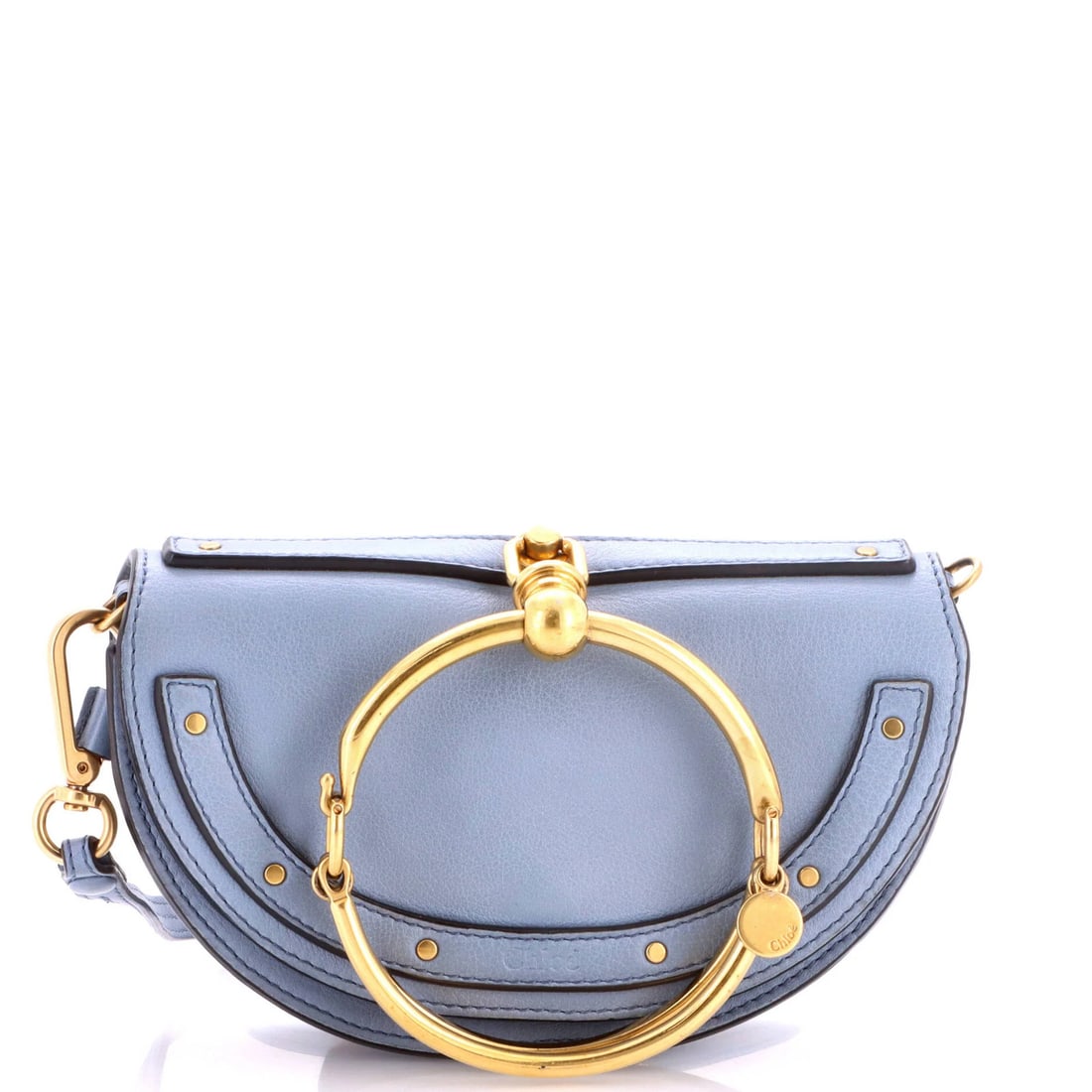Chloe Nile Crossbody Bag Leather Mini: Chloe Nile Crossbody Bag Leather Mini The Chloe Nile Crossbody Bag Leather Mini is a stylish and compact accessory, featuring a sleek blue leather exterior with minor scuffs and creases. Its neutral