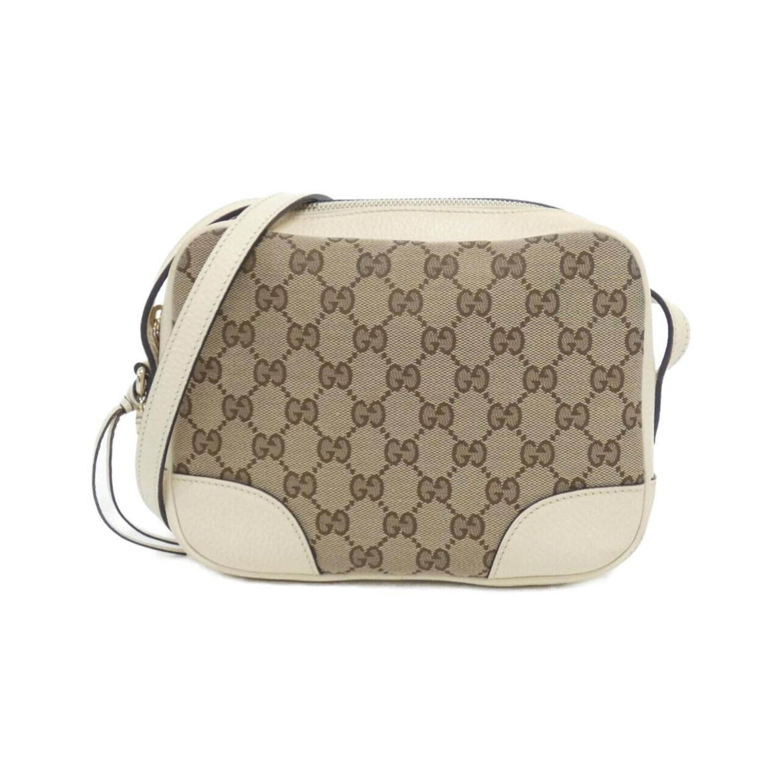 Shoulder Bag Gg Canvas: Shoulder Bag Gg Canvas The Gucci Line GG Canvas Shoulder Bag boasts a timeless design with a classic beige and ivory color combination. Made from high-quality GG canvas material, this bag features