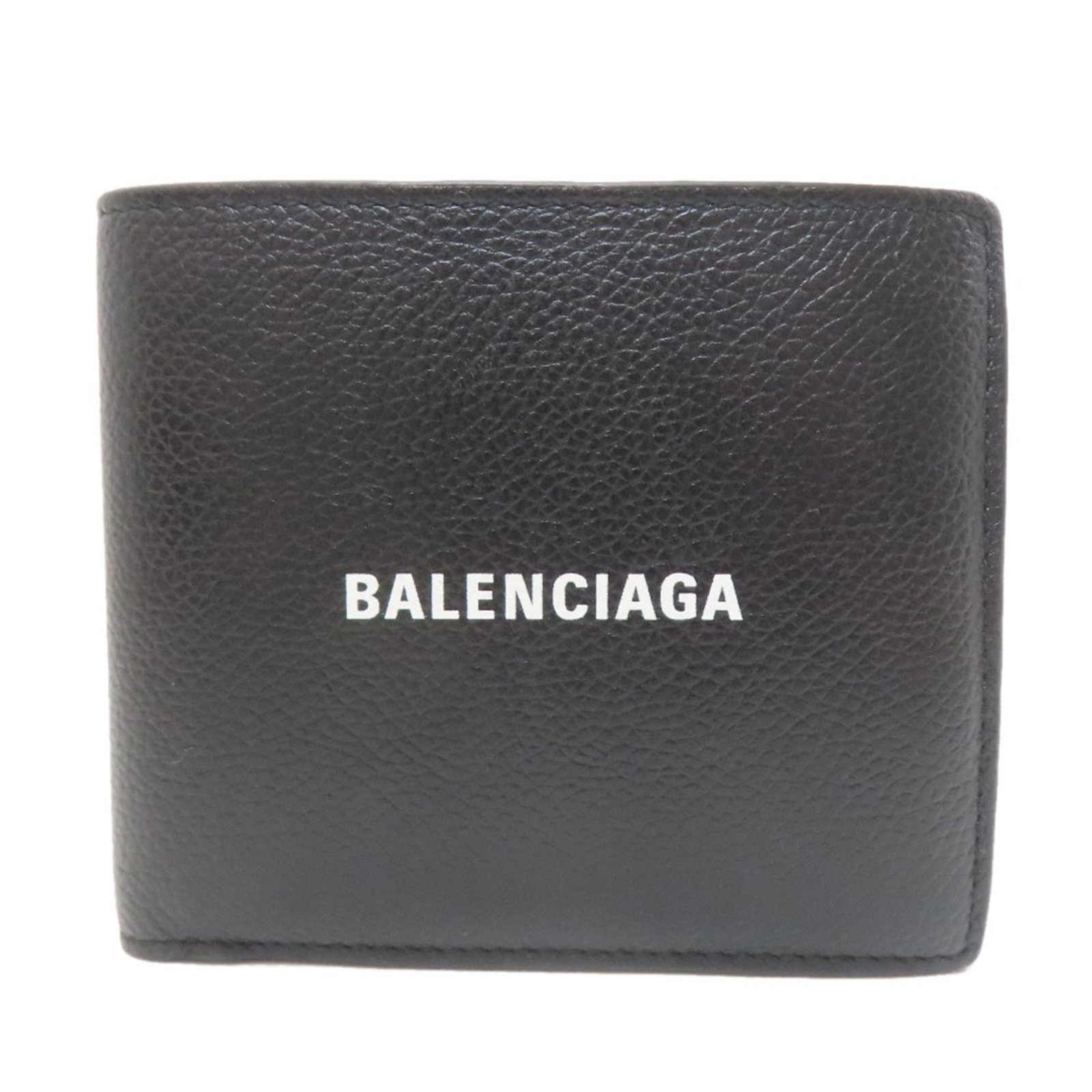 Balenciaga Wallet (Bi-Fold) Leather: Balenciaga Wallet (Bi-Fold) Leather The Balenciaga bi-fold leather wallet boasts a sleek black design with a durable leather finish, featuring a bill slot, coin purse, and card slots for organized