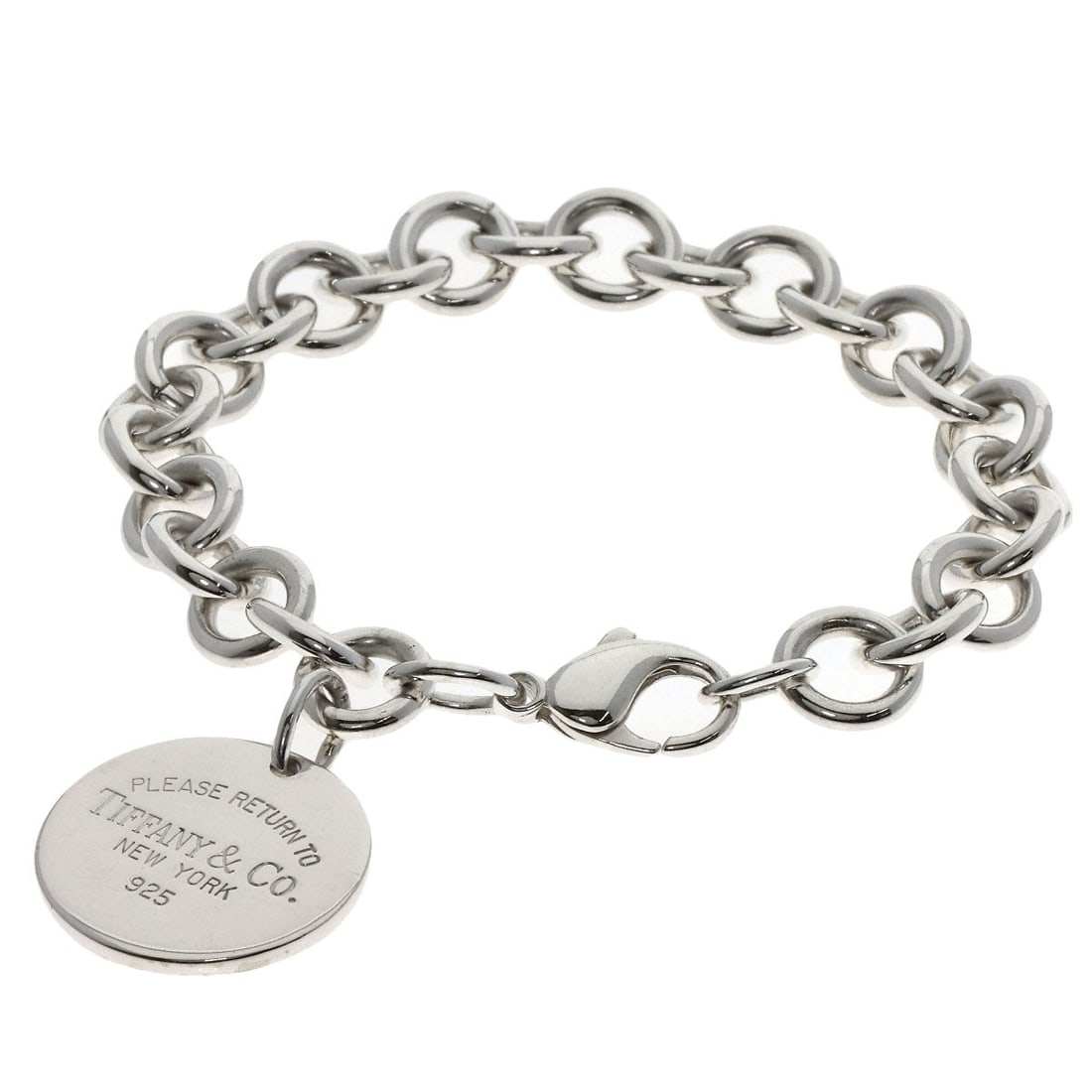 Return Tiffany Round Silver Bracelet: Return Tiffany Round Silver Bracelet Silver Tiffany Round Bracelet, a classic design from the renowned brand, features a sleek and modern silhouette crafted from sterling silver. This elegant