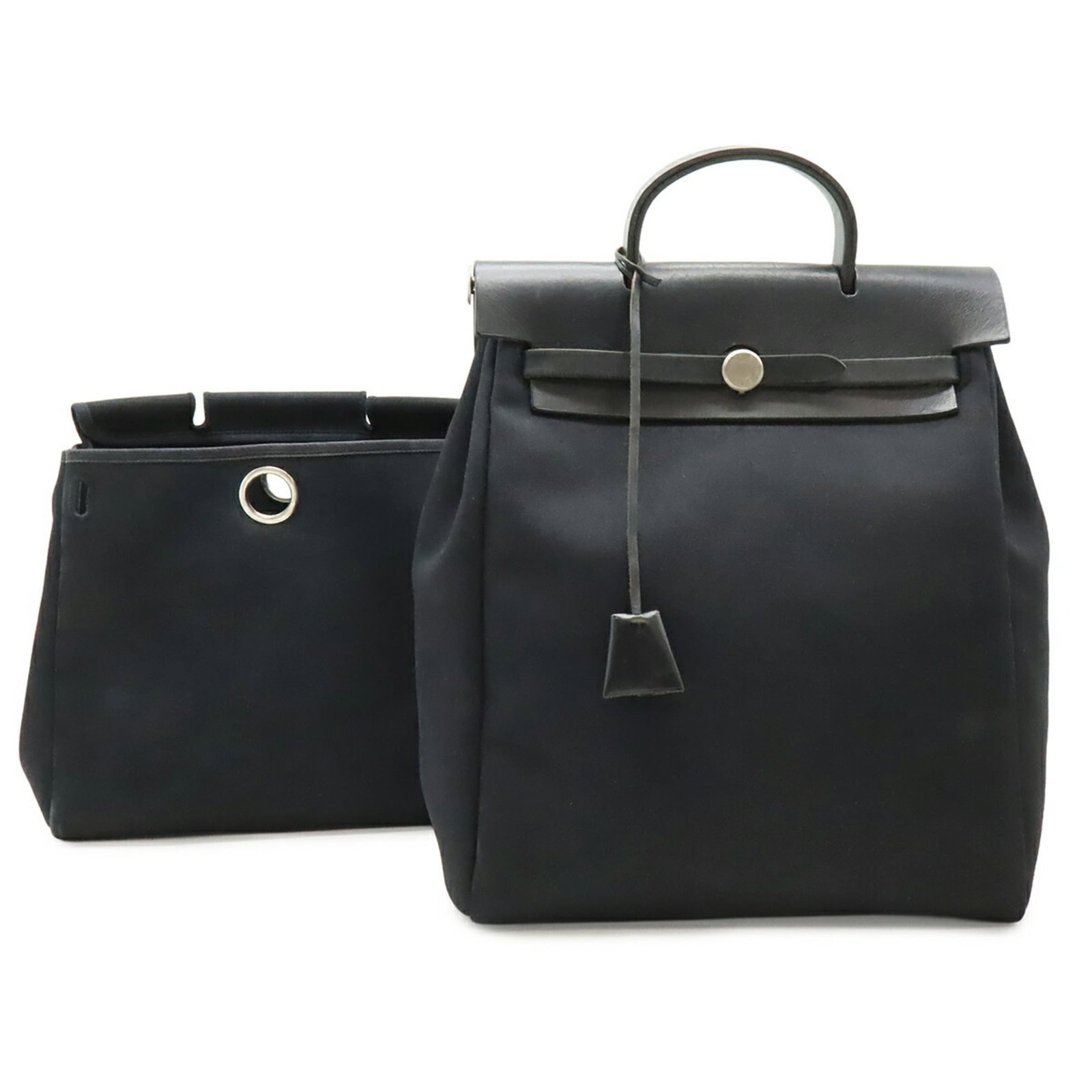 Officier Handbag Backpack Toile Hermes: Officier Handbag Backpack Toile Hermes Toile Officier Herm?s backpack in black, featuring the iconic design of the Herm?s brand, with a size of 36cm x 28.5cm x 12cm. This classic backpack is made