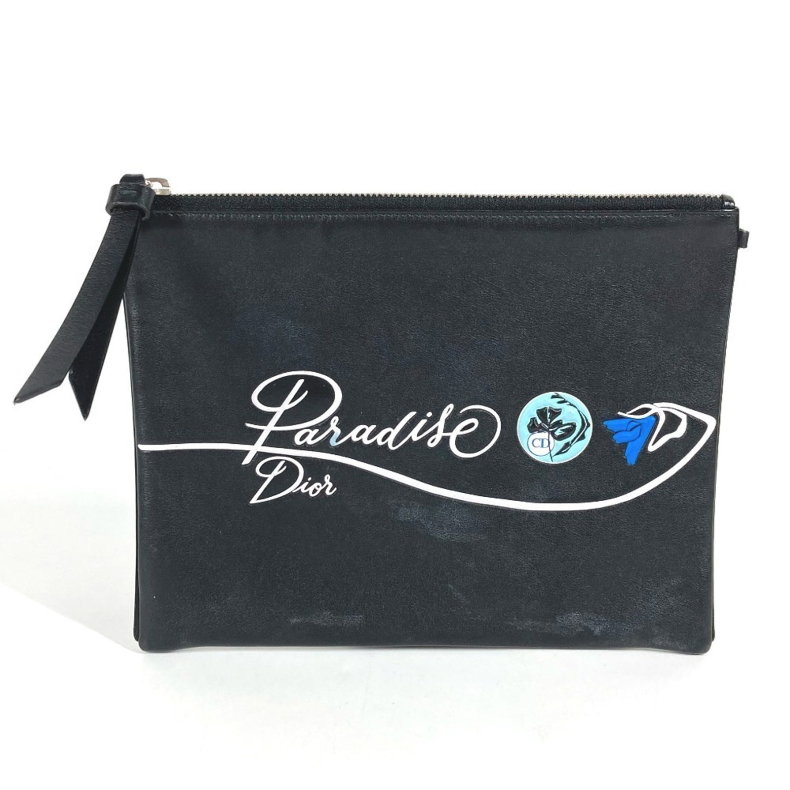 Christian Dior Leather Clutch Bag Pouch: Christian Dior Leather Clutch Bag Pouch Black leather clutch bag pouch from Christian Dior, measuring 19cm x 24cm. Made from high-quality leather, this sleek and compact design is perfect for adding
