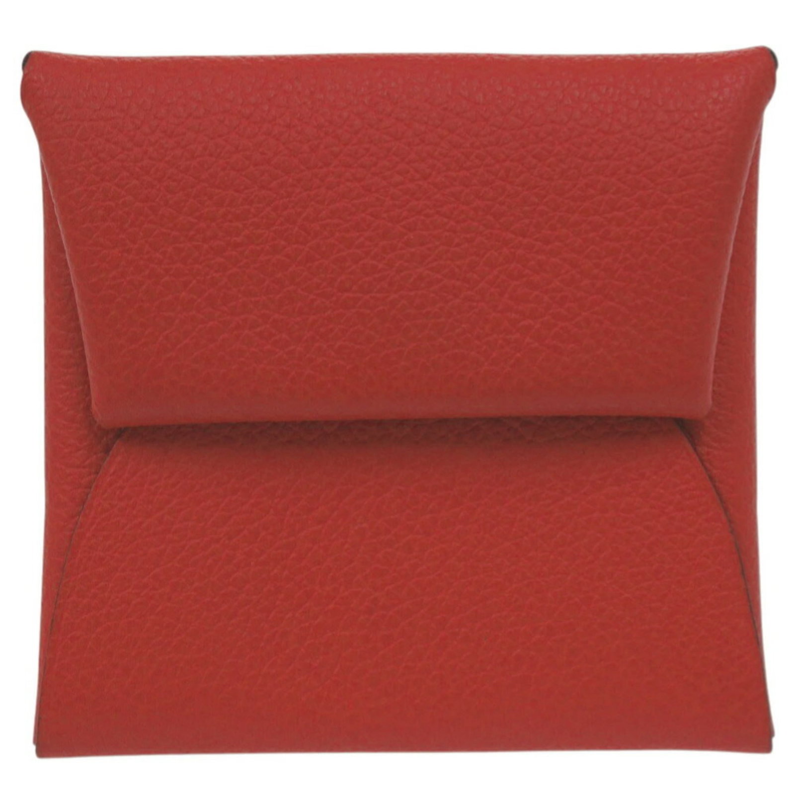Hermes Coin Evercalf Leather Purse: Hermes Coin Evercalf Leather Purse Evercalf leather craftsmanship shines in this sleek Coin purse from Hermes, measuring 8cm x 8.5cm in size. The purse comes in a sturdy box, providing a secure and