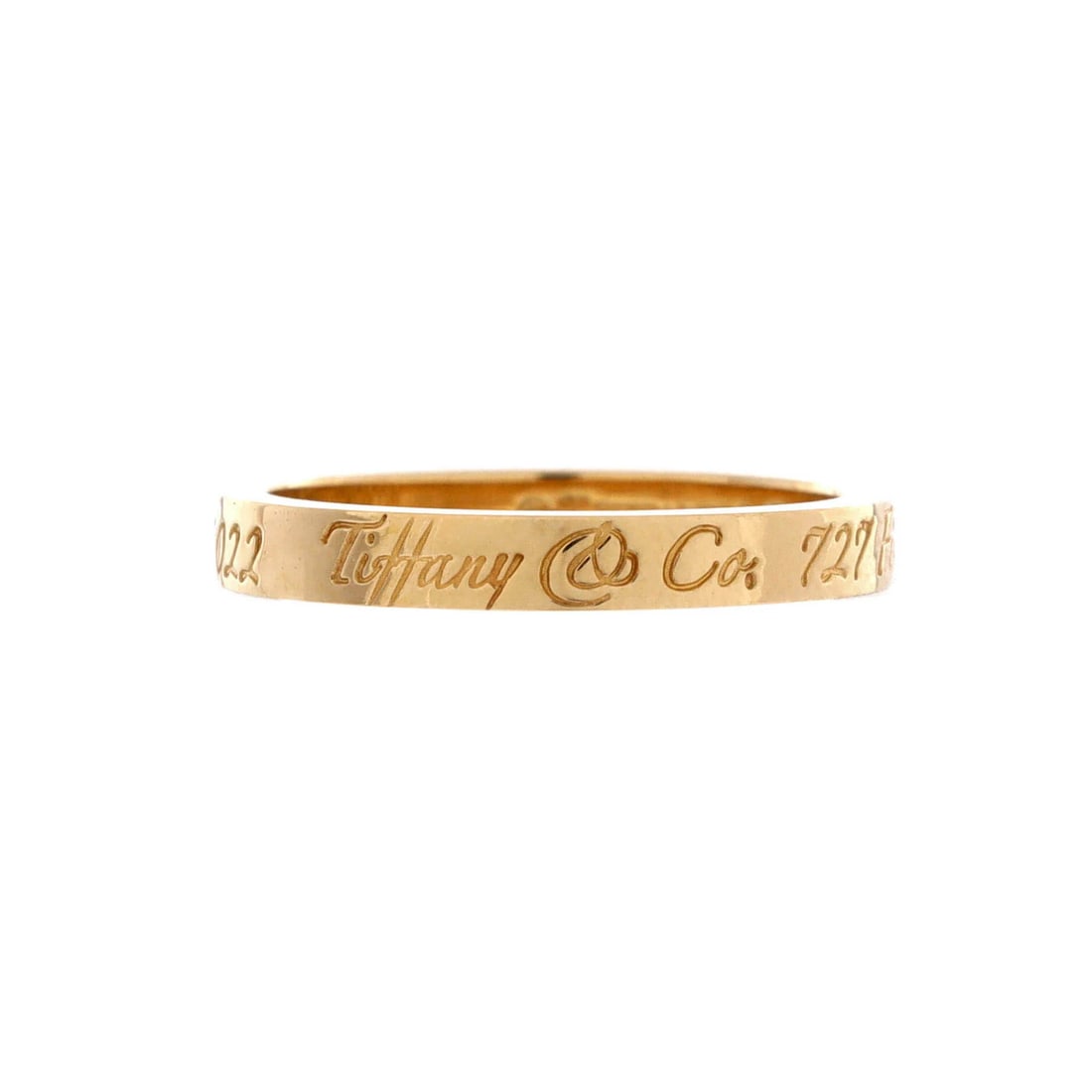 Yellow Gold Ring 18K Narrow Fifth Avenue Notes New York Tiffany: Yellow Gold Ring 18K Narrow Fifth Avenue Notes New York Tiffany 18K Yellow Gold Notes New York Tiffany Ring in Excellent Condition. This stunning 18K yellow gold ring features a narrow design with a 2