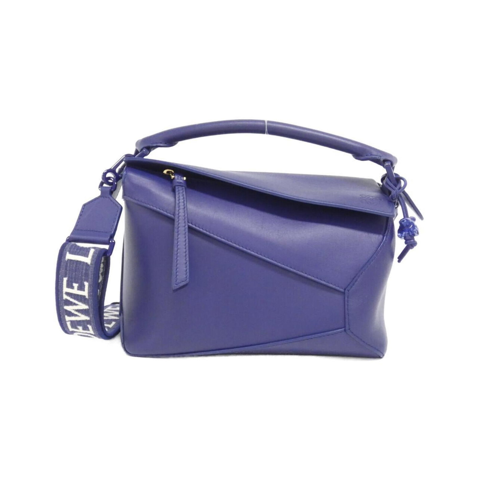 Handbag Leather Handbag: Handbag Leather Handbag Deep purple calfskin leather makes this handbag a striking addition to any outfit. With its classic design and rich, jewel-toned color, it's a timeless choice for those who app