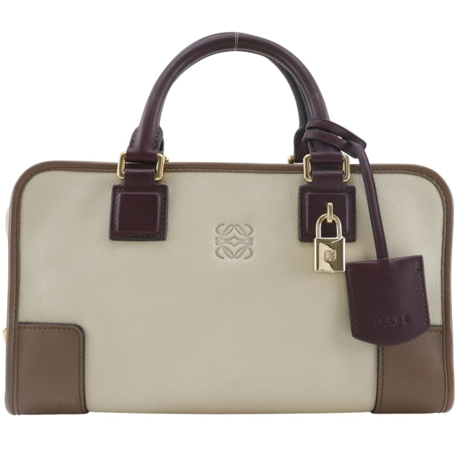 Handbag Loewe: Handbag Loewe This stunning Beige Loewe Amazona handbag boasts a sleek design with a 17cm x 29.3cm x 14.5cm size and a comfortable 10.50cm drop handle. Weighing in at 687g, its substantial weight