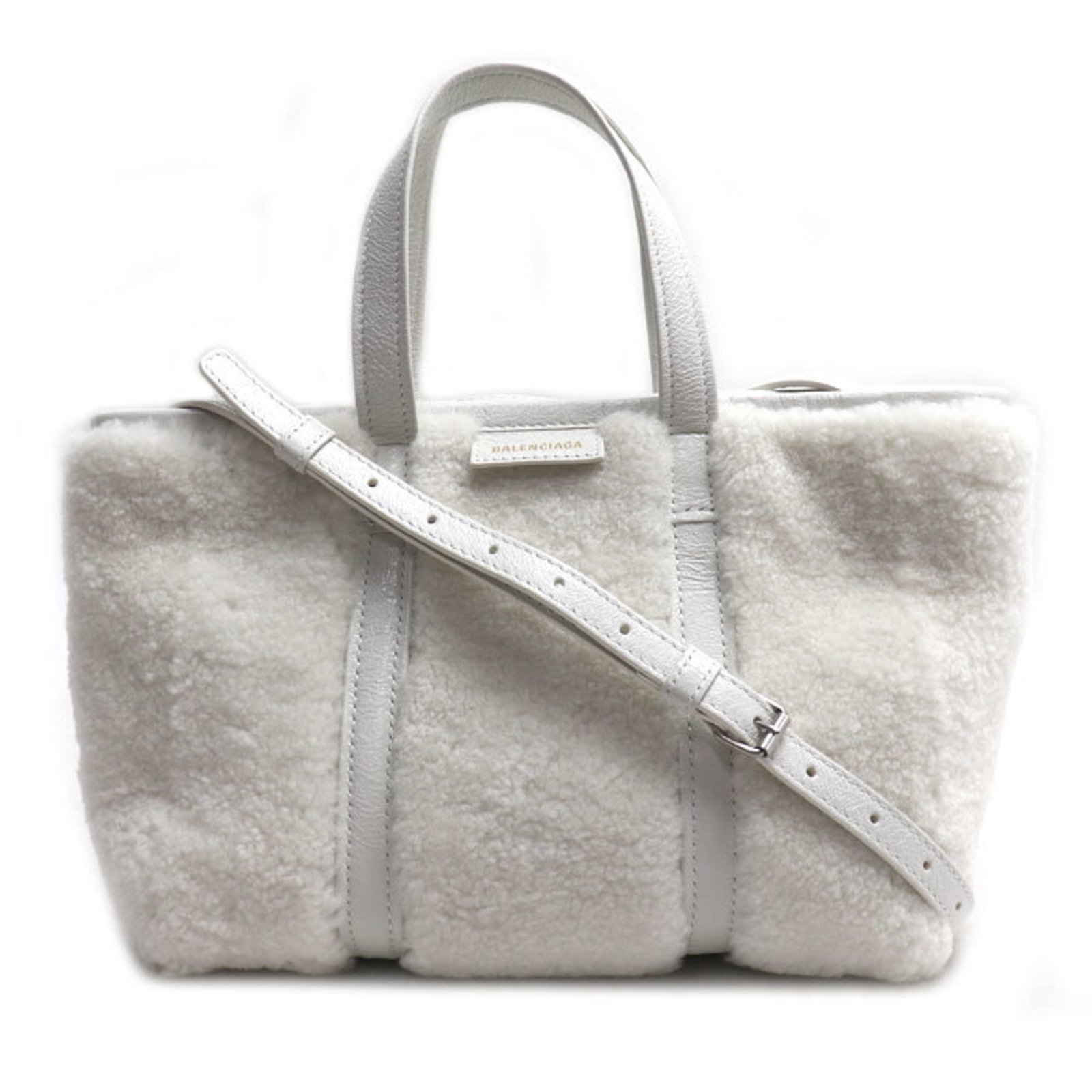 Bag Shoulder Leather Balenciaga: Bag Shoulder Leather Balenciaga Bag Shoulder Leather Balenciaga is made from high-quality leather, featuring a distinctive mouton design. The white leather bag measures 19cm x 33cm x 12cm and is a