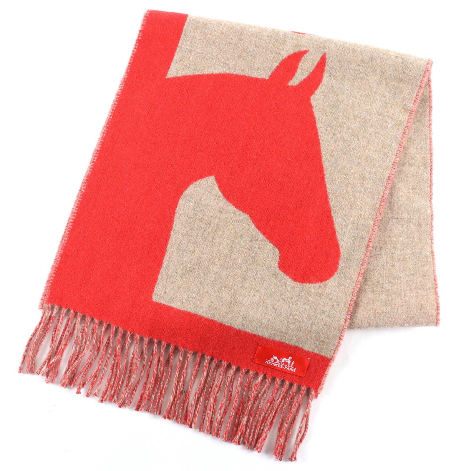 Hermes Stole Cashmere: Hermes Stole Cashmere The Hermes Stole Cashmere is a stunning piece of craftsmanship, boasting a rich beige color and striking red accents. Crafted from the finest cashmere material, this stole