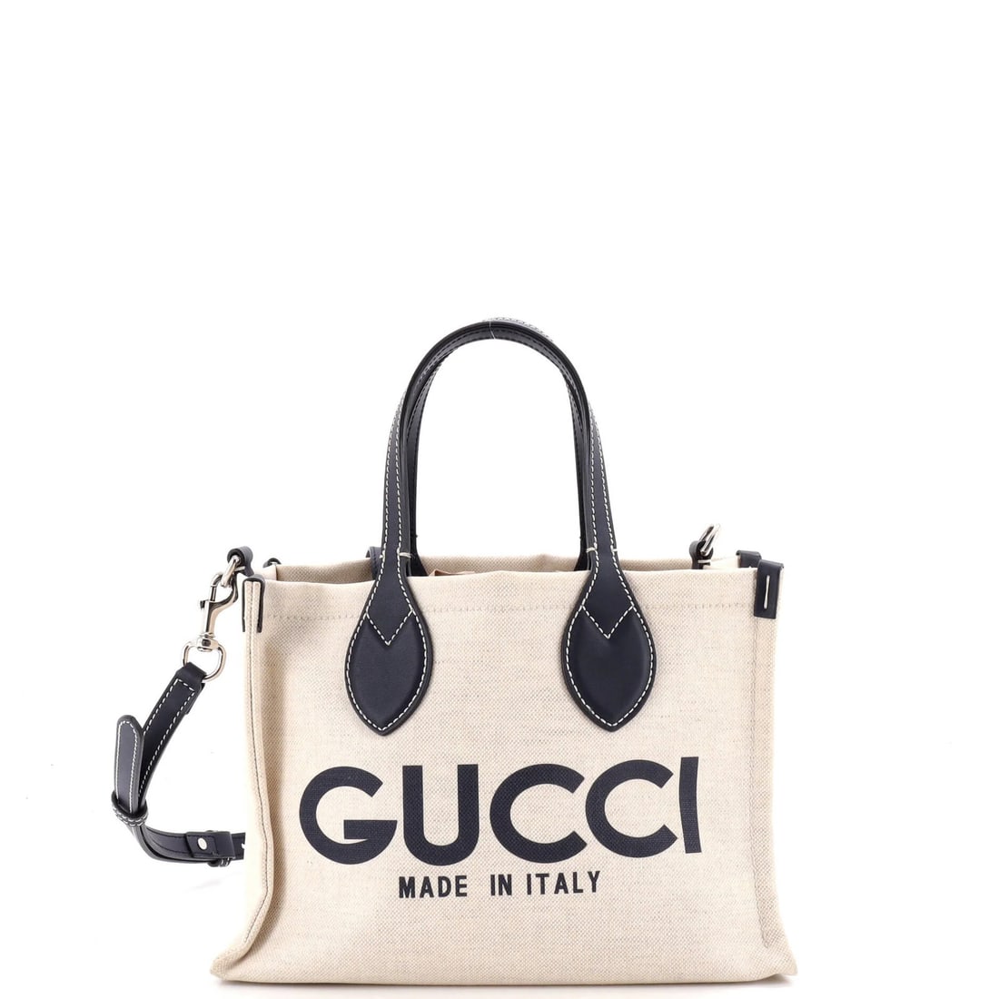Gucci Logo Shopper Tote Printed Canvas Small: Gucci Logo Shopper Tote Printed Canvas Small Canvas Gucci Logo Shopper Tote in Blue. This small shoulder bag features a printed design and comes with a base shaper and strap. The exterior shows signs 