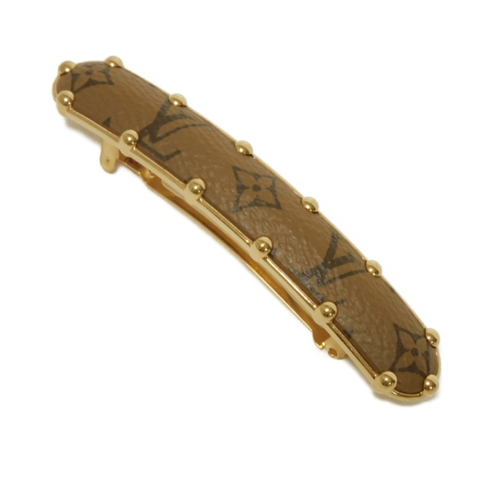 Canvas Monogram Barrette Louis Vuitton: Canvas Monogram Barrette Louis Vuitton Canvas Monogram Barrette Louis Vuitton bears a signature. Made from canvas and featuring the iconic Monogram pattern, this barrette measures 1.2cm x 9.19cm. Its 