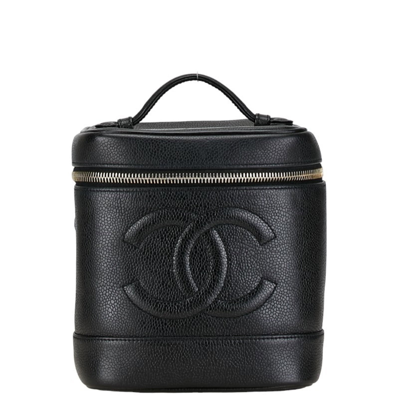 Vanity bag caviar leather Chanel handbag: Vanity bag caviar leather Chanel handbag Black caviar leather Chanel handbag with gold zipper and 2.50cm drop handle, measuring 17cm x 14.5cm x 13cm. This vanity bag features caviar leather constructi
