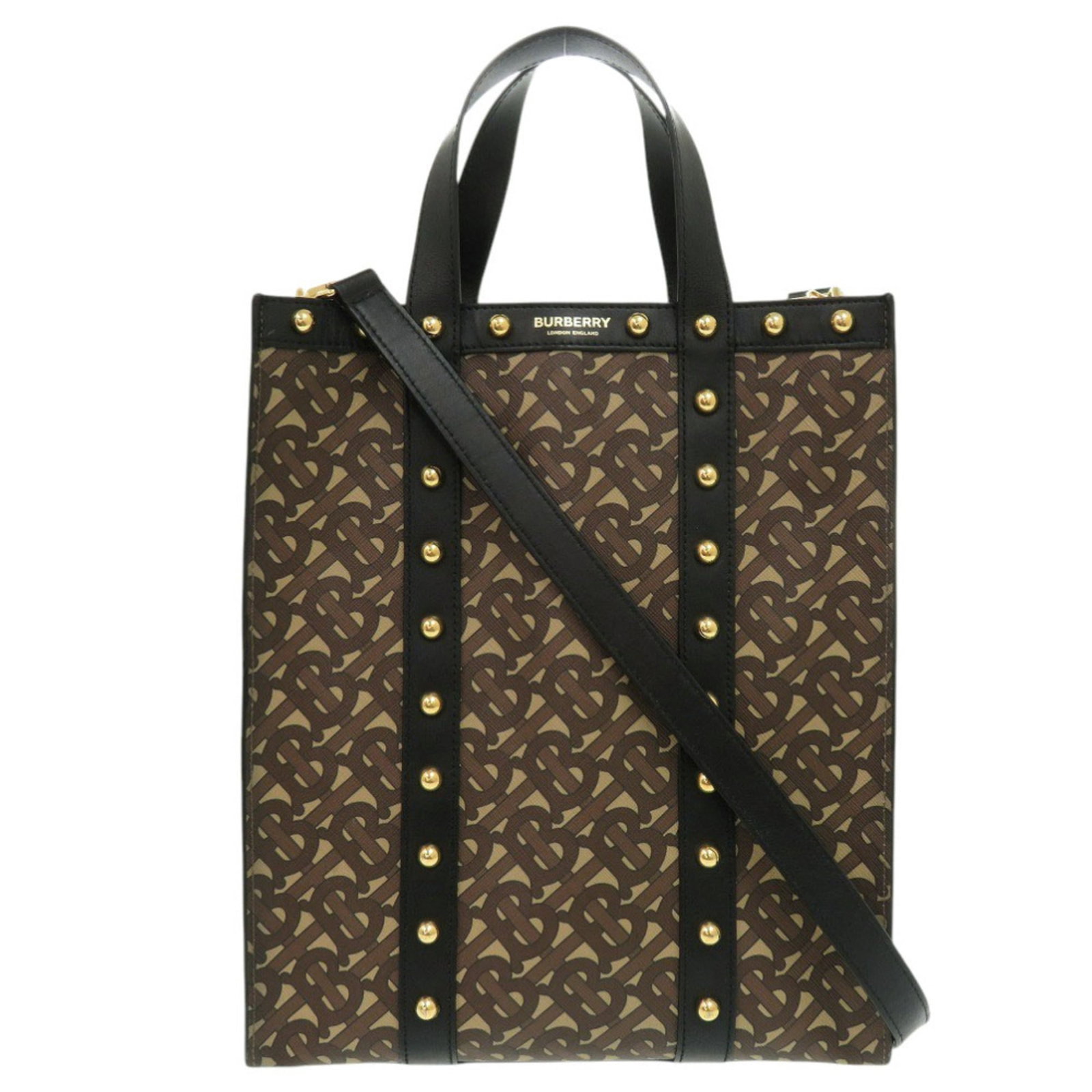 Pvc Handbag Burberry Tote: Pvc Handbag Burberry Tote PVC Handbag Burberry Tote in Black and Brown, featuring a gold snap fastener closure, open pocket, and adjustable shoulder strap. Made from high-quality PVC material, this