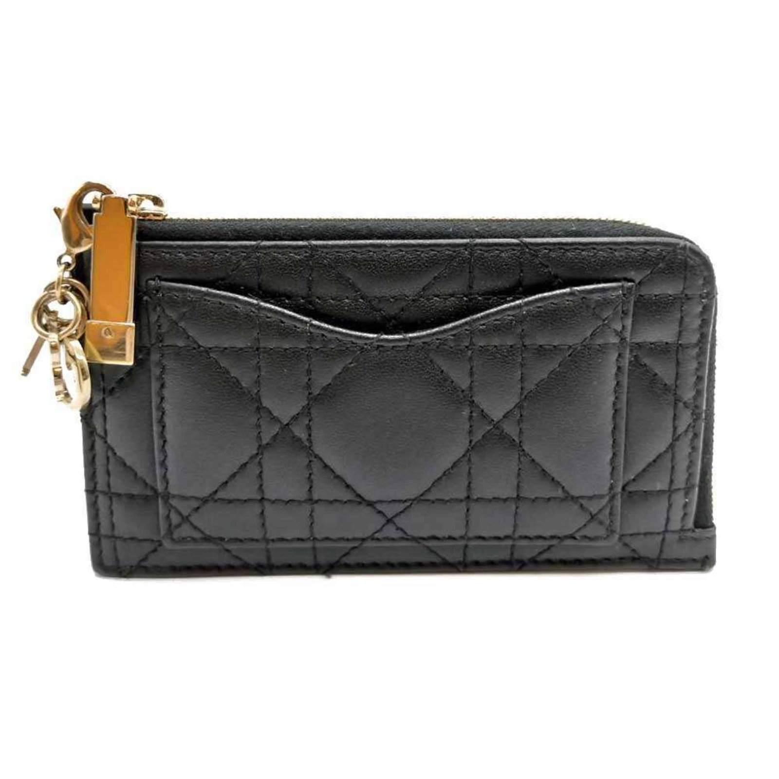 Dior Christian Coin Leather Purse: Dior Christian Coin Leather Purse Black coin leather purse from Christian Dior, featuring a zipper closure and measuring 8cm x 13cm x 5.00mm. This small leather purse is made from high-quality