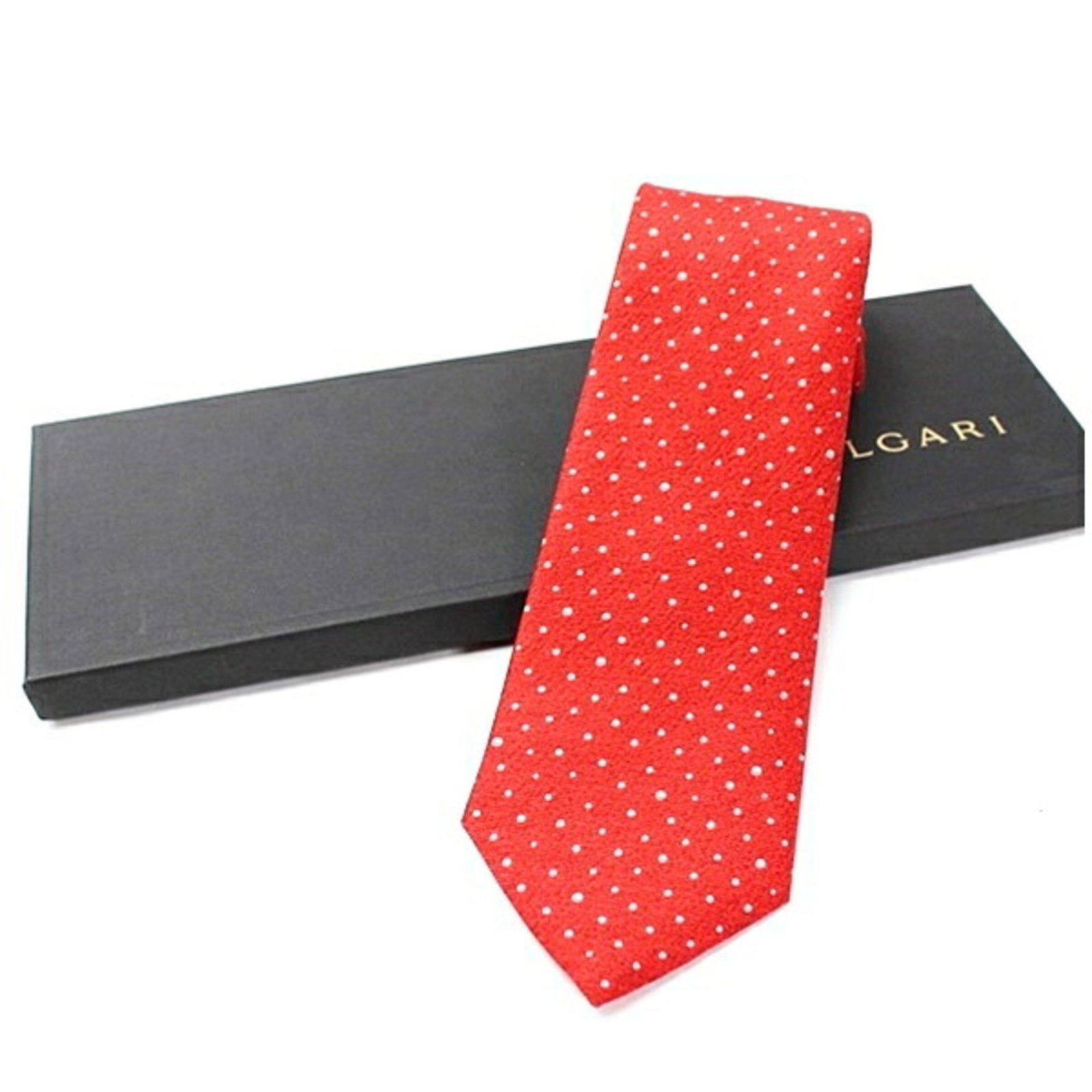 Cravat Silk Bvlgari: Cravat Silk Bvlgari Silk cravat from Bvlgari, featuring a subtle gray and red color combination, with a width of 9.5cm. Made from high-quality silk, this cravat is a stylish accessory for formal occas