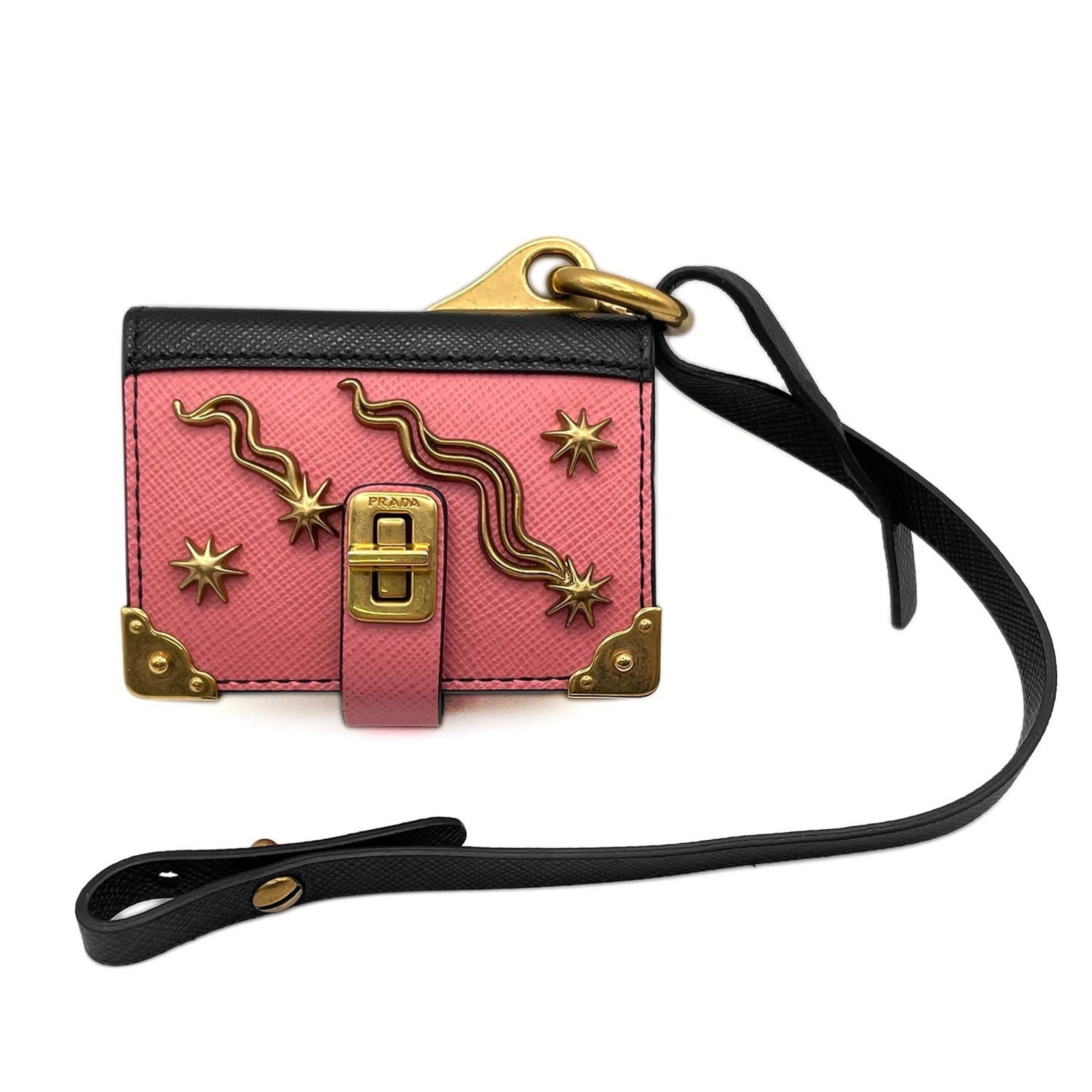 Prada metal leather keyring: Prada metal leather keyring The Prada metal leather keyring boasts a sleek, modern design with a striking combination of black leather and metal accents. Its compact size makes it a versatile accessor