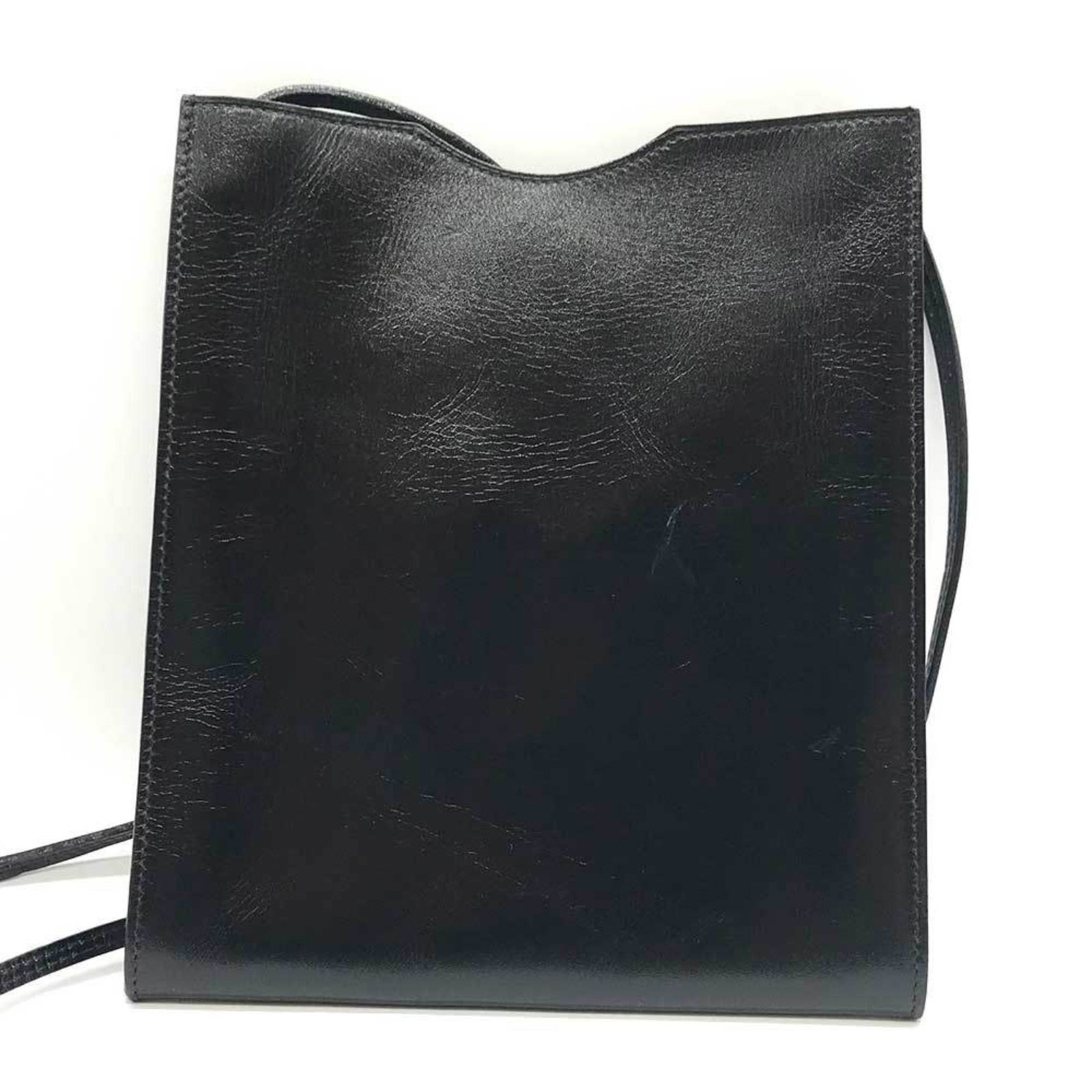 Calf Leather Pochette Bag Box Hermes Shoulder: Calf Leather Pochette Bag Box Hermes Shoulder Box calf leather construction adds a touch of sophistication to this black Onimaitou pochette bag, featuring an open closure and a sleek, streamlined