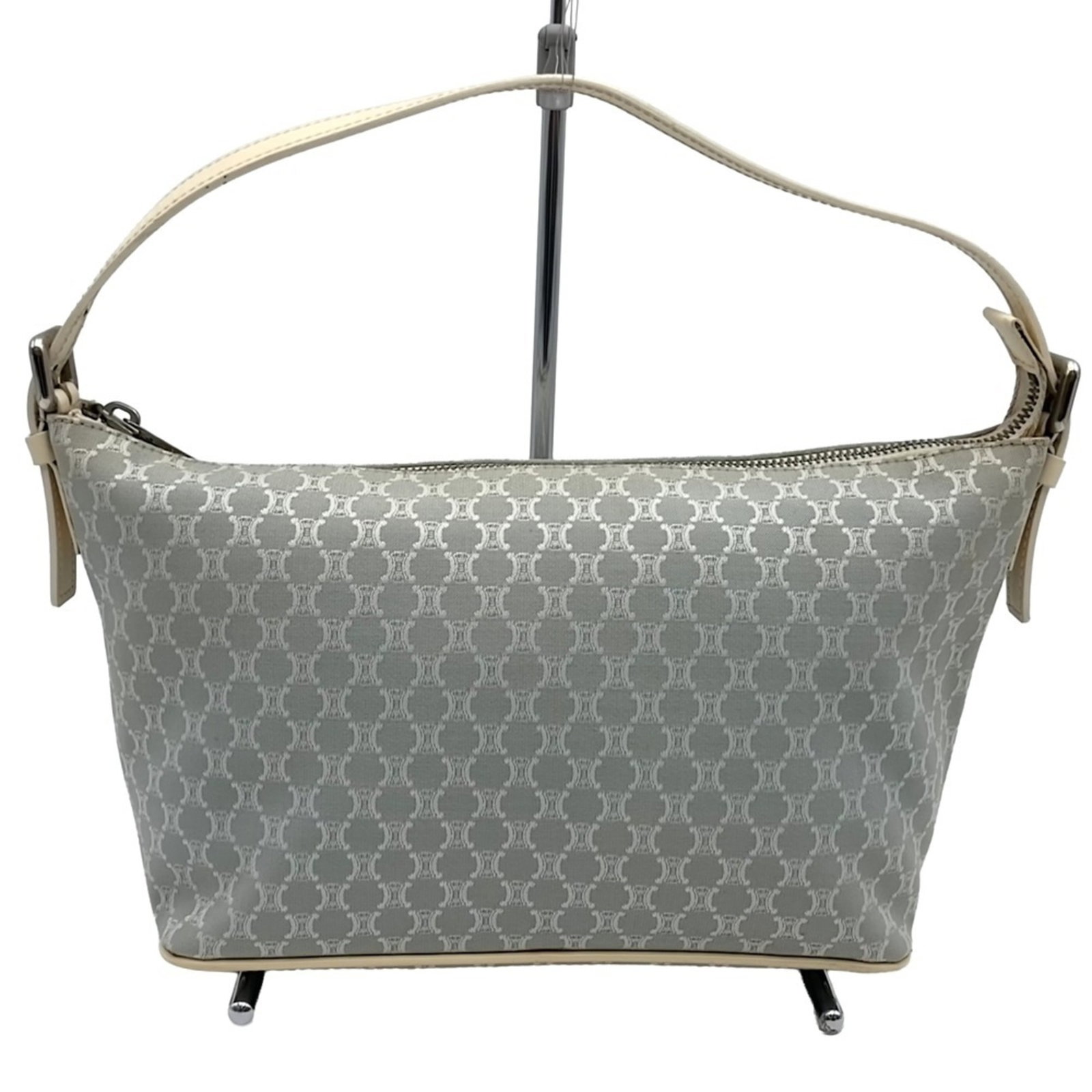 Canvas Celine Handbag Shoulder: Canvas Celine Handbag Shoulder Canvas Celine Handbag Shoulder. This canvas shoulder bag from Celine measures 16cm x 29cm x 11cm and features a gray color. The bag bears a signature, a notable detail