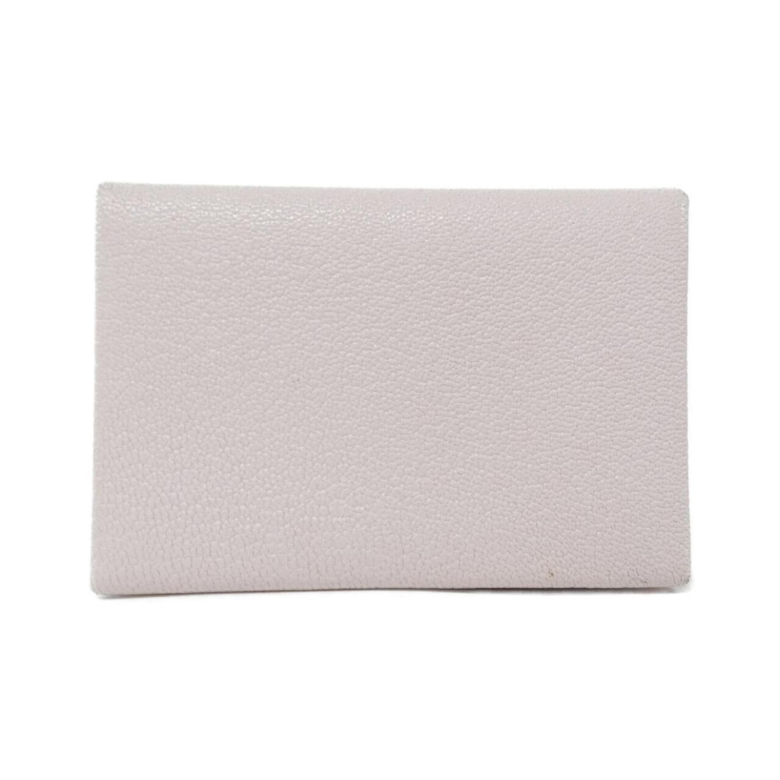 Hermes Coin Case Leather Purse Chevre: Hermes Coin Case Leather Purse Chevre Chevre leather purse in a soft pink hue, measuring 7cm x 11cm, features a sleek design with a compact size. Made from high-quality chevre leather, this coin case