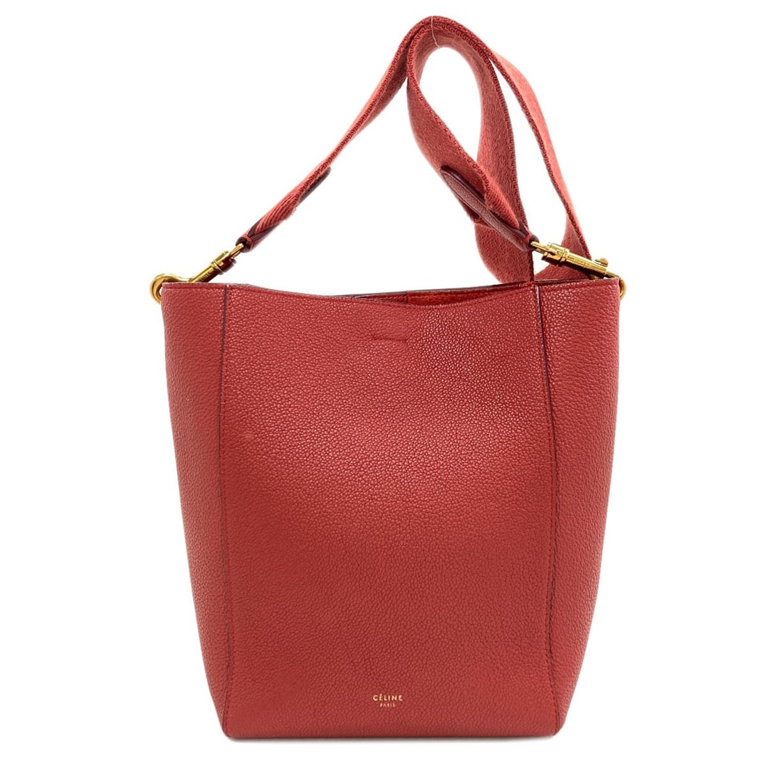Calf Sangle Bucket Shoulder Bag: Calf Sangle Bucket Shoulder Bag Red Calf Sangle Bucket Shoulder Bag from CELINE, featuring a striking exterior color and high-quality calf material. This stylish shoulder bag boasts a distinctive sang
