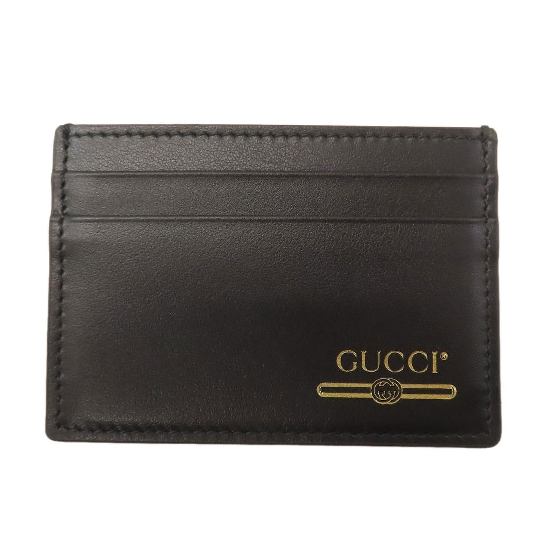 Gucci 547596 Logo Card Case Leather: Gucci 547596 Logo Card Case Leather Gucci's 547596 Logo Card Case Leather is a sleek and sophisticated accessory. Made from high-quality black leather, this card case features the iconic Gucci logo, a