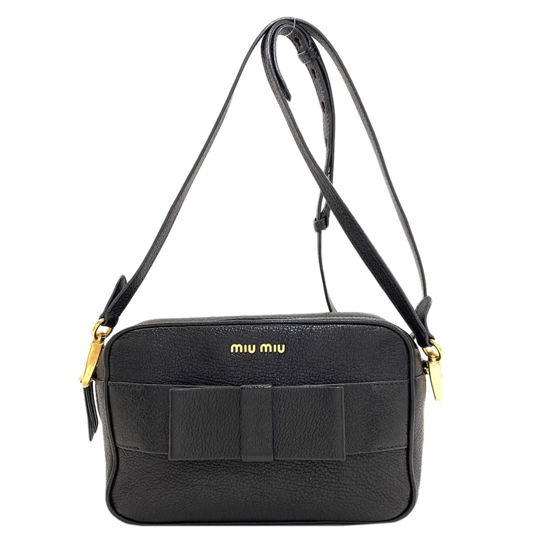 Leather Motif Ribbon Shoulder Bag: Leather Motif Ribbon Shoulder Bag Black leather shoulder bag with a distinctive motif, featuring a 5.5 inch height and 2.4 inch depth. Made from high-quality leather, this bag has a sleek black