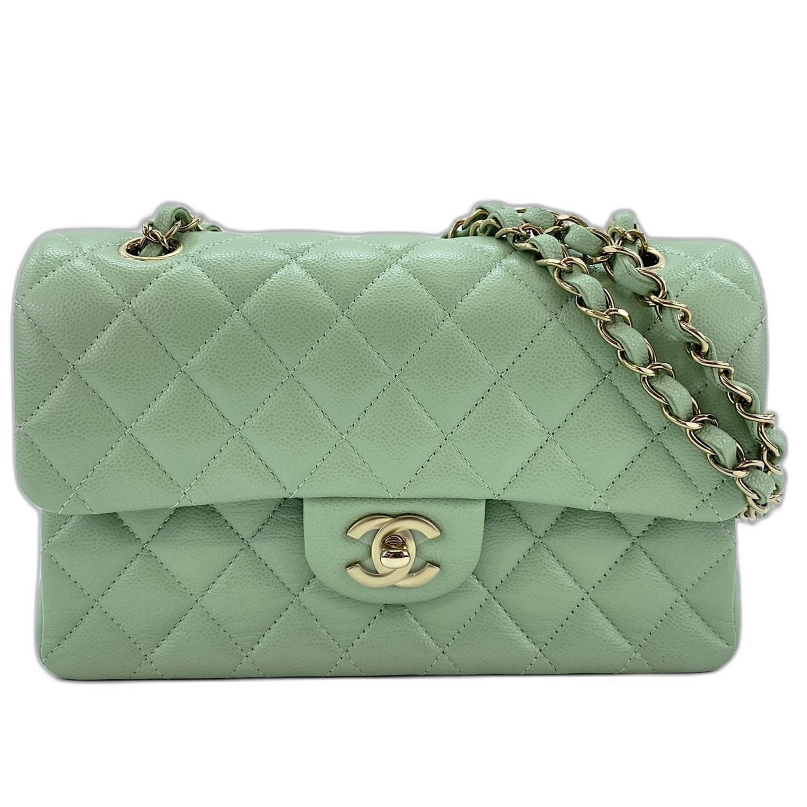Shoulder Bag by Chanel: Shoulder Bag by Chanel The Matelasse shoulder bag by Chanel is a stylish and elegant accessory featuring a green color and a flap closure. Measuring 15cm x 23cm x 6cm, this bag is designed to be a com