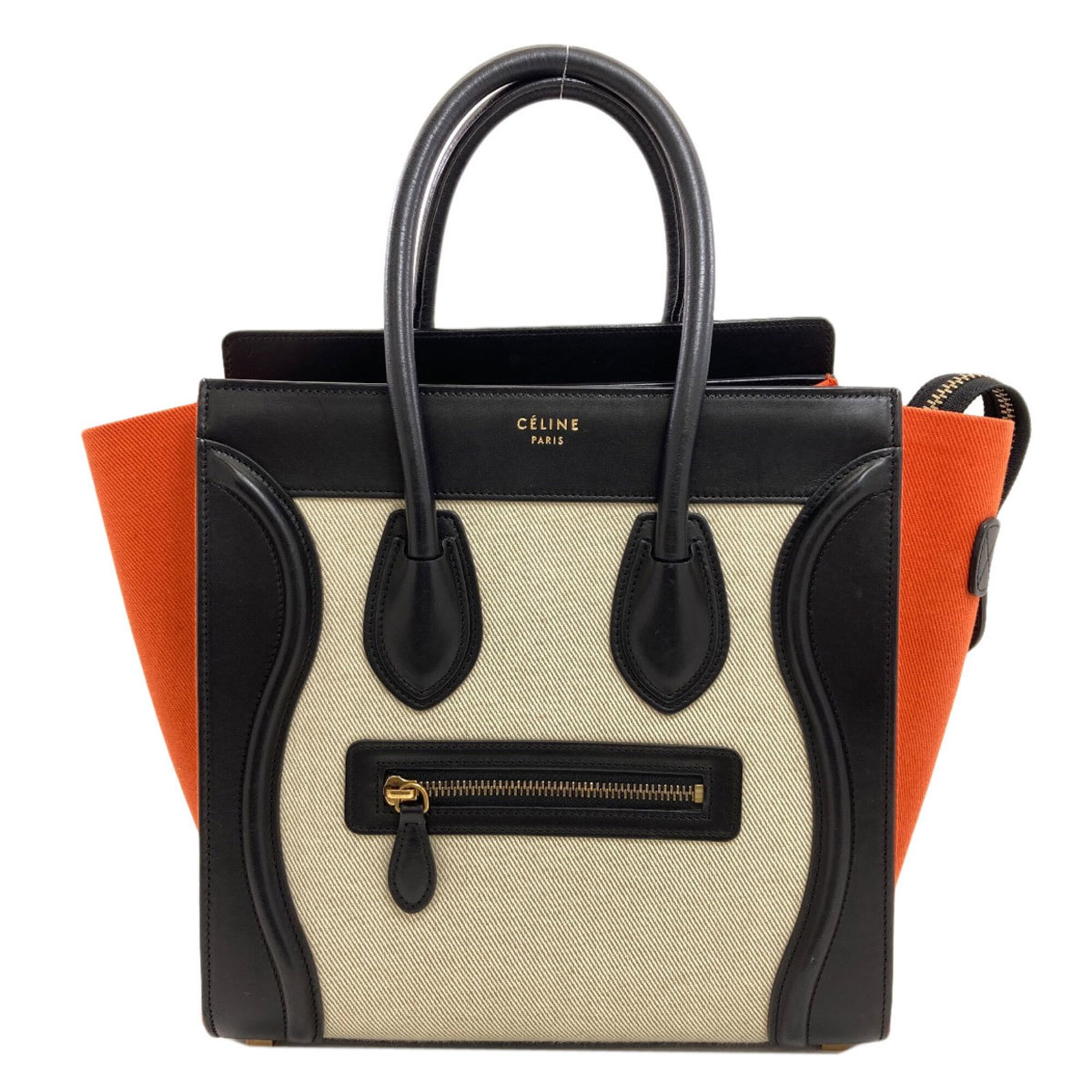 Handbag Canvas Leather: Handbag Canvas Leather Canvas and leather come together in this sleek black handbag, featuring a striking orange accent and crisp white stitching. Measuring 28cm x 40cm x 13.5cm, it offers a compact a