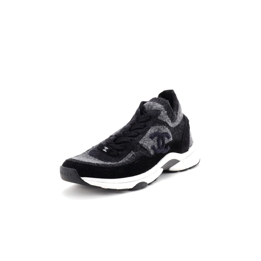 Sneakers Suede and Knit Fabric Low-Top Women's CC Chanel: Sneakers Suede and Knit Fabric Low-Top Women's CC Chanel Suede and knit fabric low-top sneakers from Chanel, featuring a sleek black exterior and interior. Minor creasing and discoloration are present