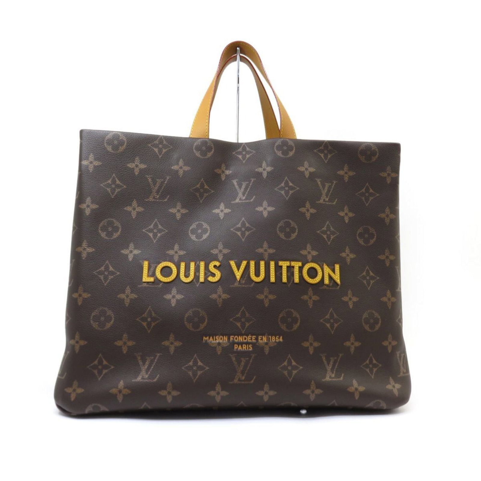 Shoulder Bag Tote Bag by Louis Vuitton: Shoulder Bag Tote Bag by Louis Vuitton The Louis Vuitton Shoulder Bag Tote Bag boasts a classic design with a timeless 32cm x 40cm x 16cm size, perfect for daily use. Its iconic monogram pattern adds 
