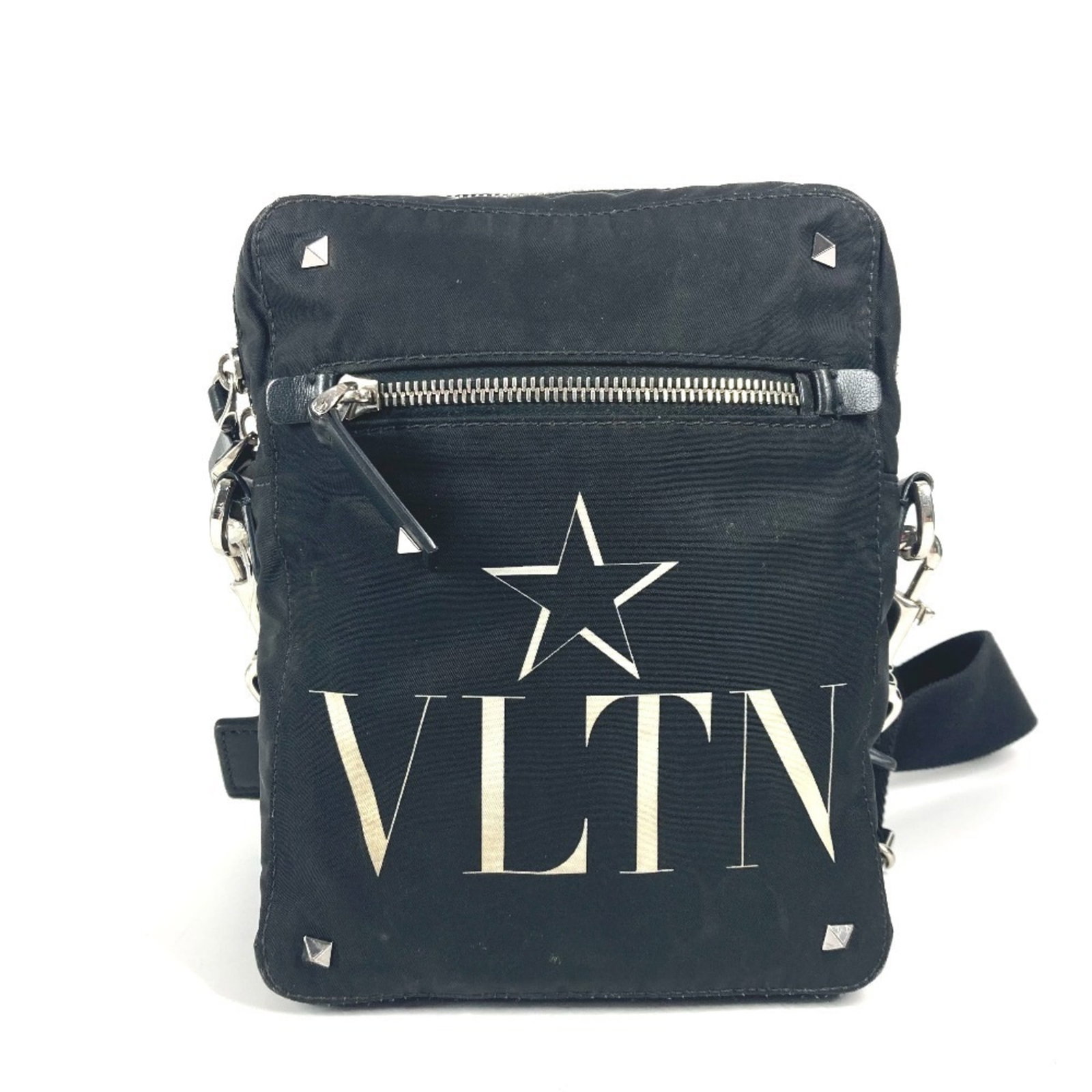 Nylon Valentino Pochette Shoulder Bag: Nylon Valentino Pochette Shoulder Bag The Valentino Pochette Shoulder Bag is a sleek and modern design made from high-quality nylon. Measuring 21cm x 16.5cm x 4.5cm, this black and white shoulder bag