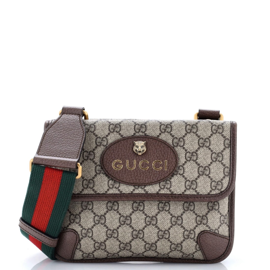 Small canvas messenger flap coated GG Gucci: Small canvas messenger flap coated GG Gucci Small canvas messenger flap coated GG Gucci bag in brown exterior, featuring a neutral interior and aged gold hardware. The bag boasts a classic neo