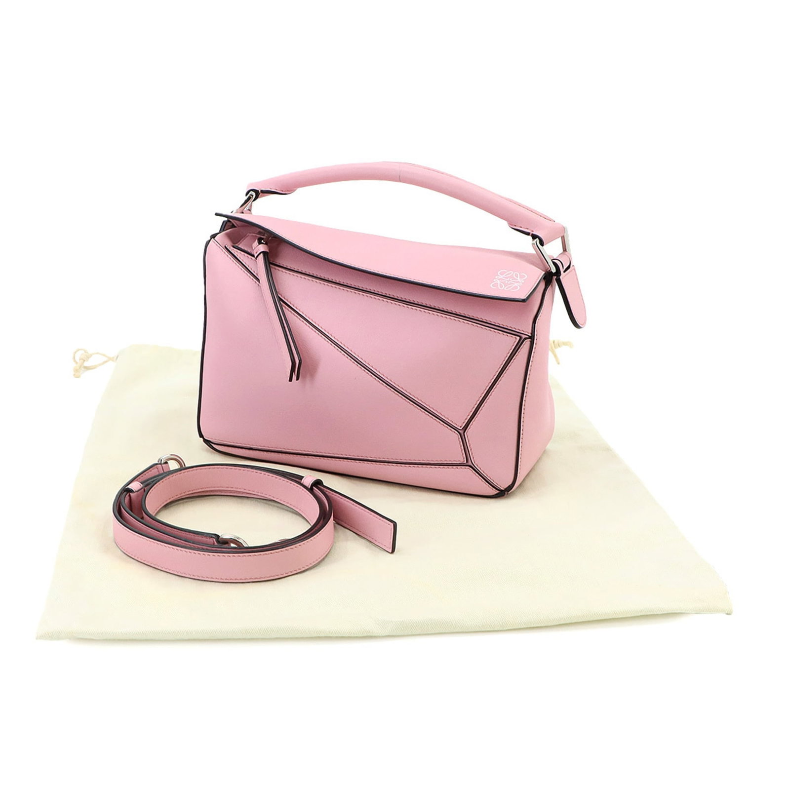 Handbag Leather Handbag: Handbag Leather Handbag Pink leather handbag from Loewe, Spain, with dimensions 16cm x 24.5cm x 10cm. This handbag features high-quality leather construction and a distinctive pink color. Made in