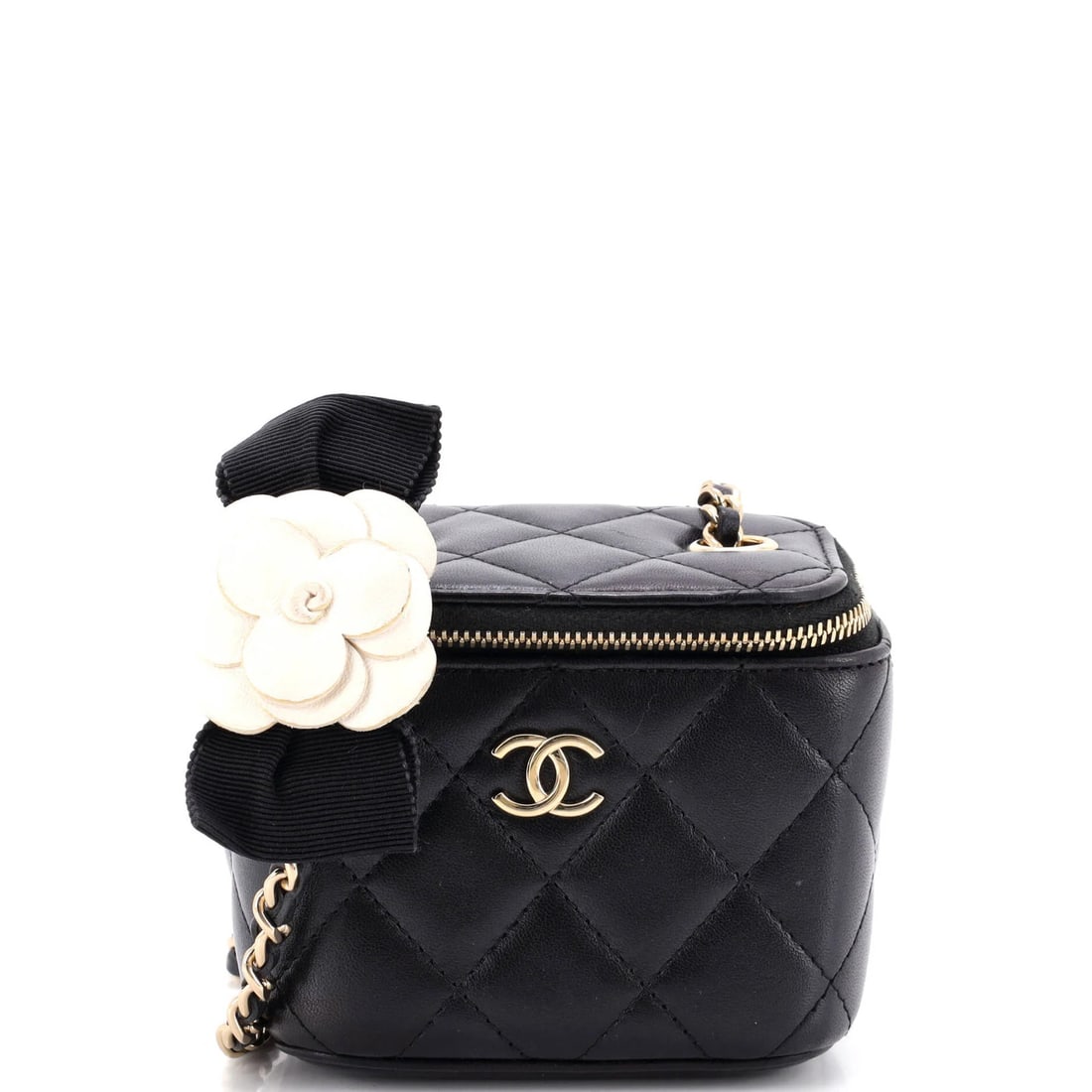 Camellia Bow Vanity Case with Chain Quilted Lambskin Mini Chanel: Camellia Bow Vanity Case with Chain Quilted Lambskin Mini Chanel The Camellia Bow Vanity Case with Chain Quilted Lambskin Mini Chanel boasts a sleek black leather exterior adorned with a delicate