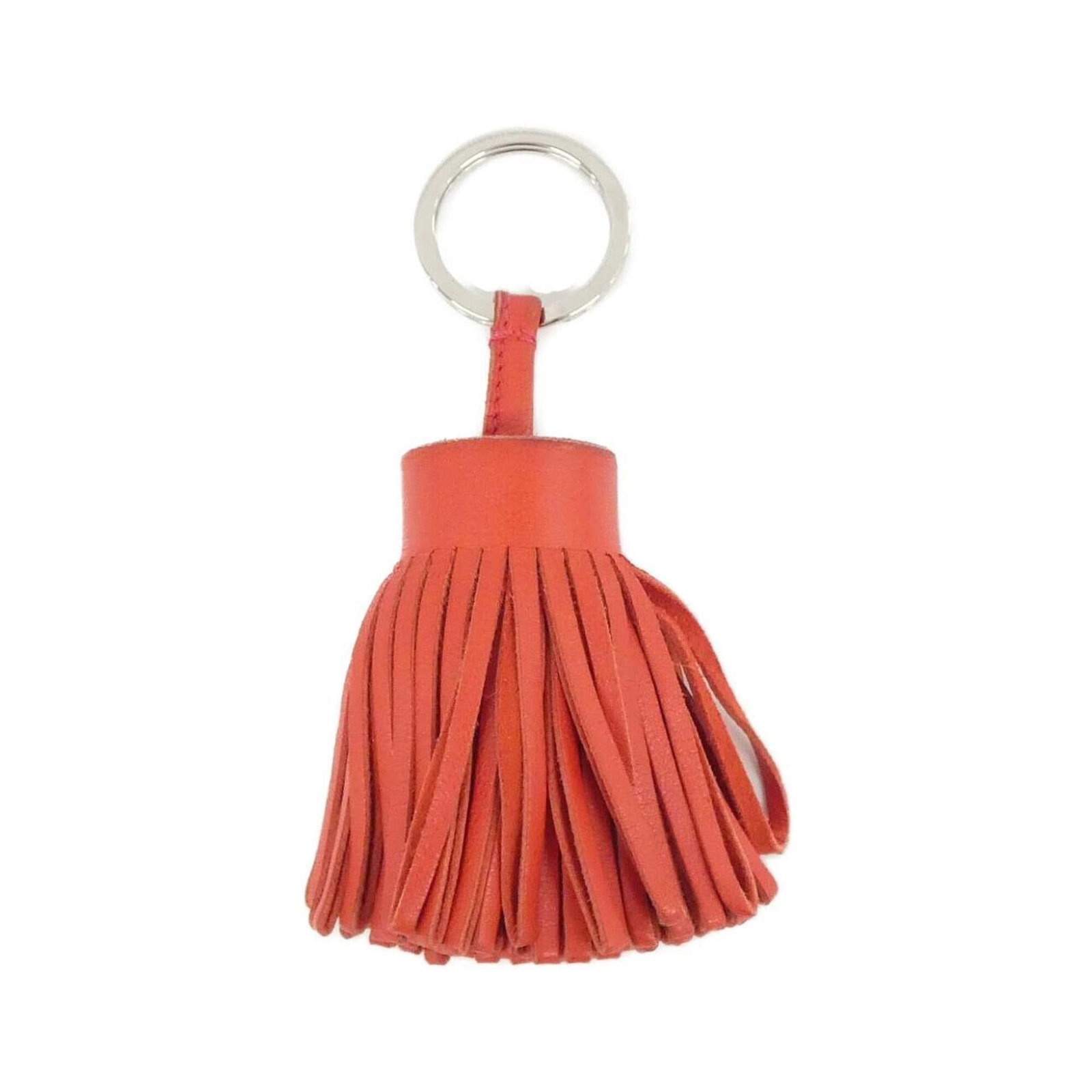 Keyring Agneau Milo Hermes: Keyring Agneau Milo Hermes Agneau Milo is a high-quality material known for its softness and durability, making it a great choice for a keyring. This Hermes keyring features a striking red color and a