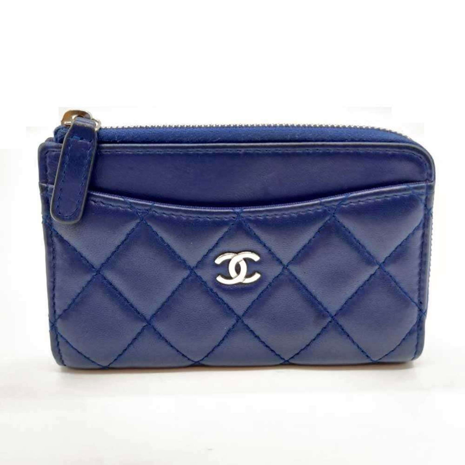 Chanel Card Case Leather: Chanel Card Case Leather Made from luxurious lambskin leather, this Chanel card case boasts a sleek, blue hue that adds a touch of sophistication to any accessory collection. Measuring 9cm x 13cm x