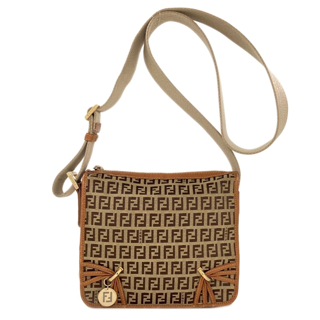 Fendi Canvas Long Shoulder Bag Zucca Pattern: Fendi Canvas Long Shoulder Bag Zucca Pattern Brown canvas shoulder bag with long shoulder strap and Zucca pattern. Made from canvas, this bag features a classic shoulder style with a distinctive