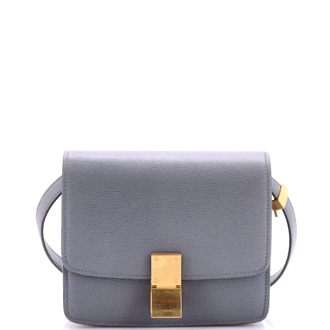 Teen grainy leather classic box bag: Teen grainy leather classic box bag The Celine Classic Box Bag is a timeless, grainy leather shoulder bag with a classic design. Measuring 6" tall, 7" wide, and 2" deep, this bag features a gray exter