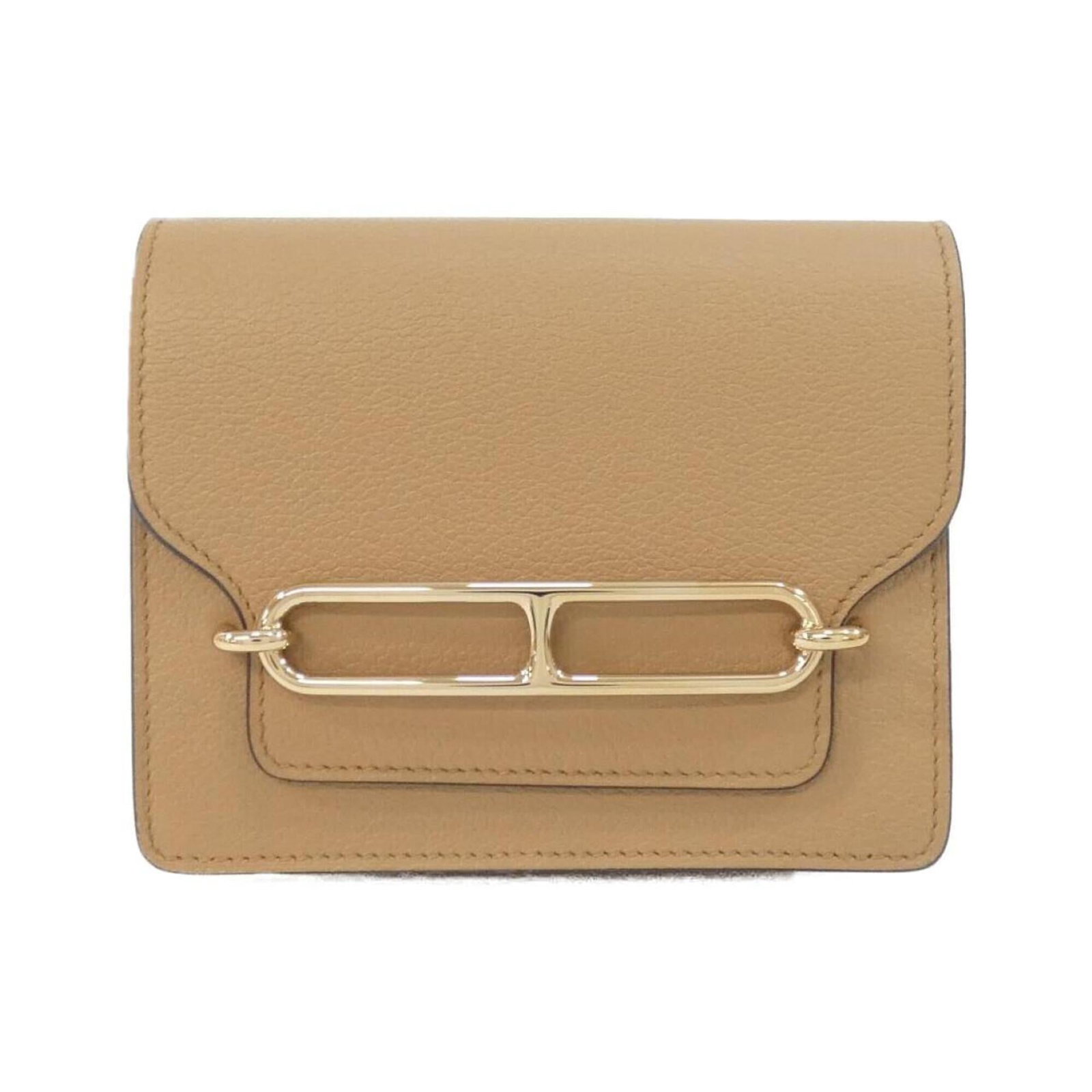 Bi-fold Wallet by Hermes: Bi-fold Wallet by Hermes Brown bi-fold wallet by Hermes, measuring 10cm x 12cm x 2.5cm, offering a compact and stylish storage solution. This classic design features a durable construction and a